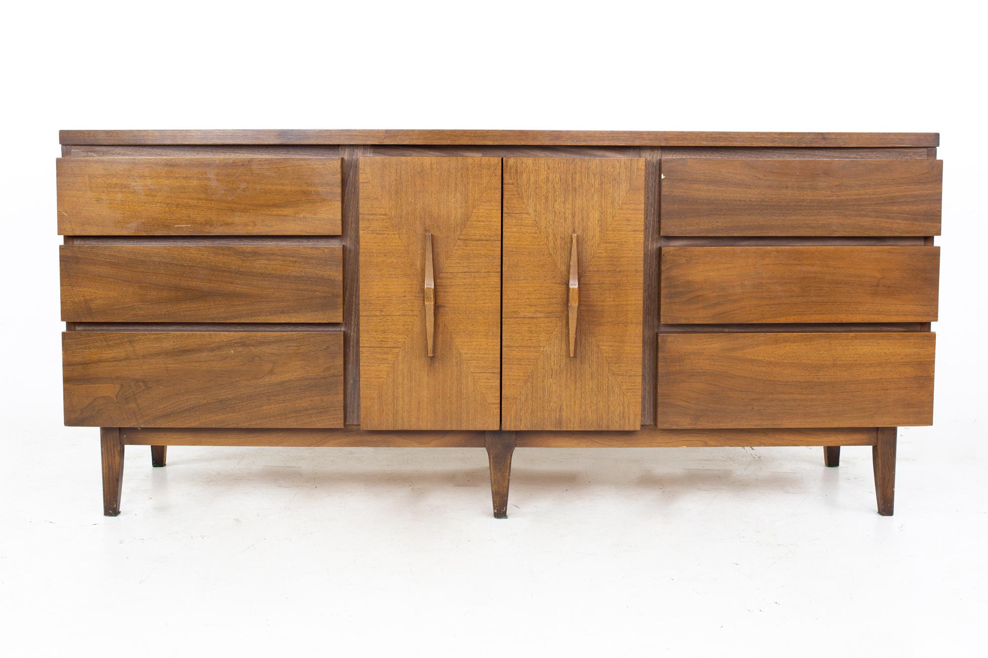Mid century harlequin bow front inlaid walnut 9 drawer lowboy dresser
Dresser measures: 72 wide x 19.25 deep x 32 inches high

All pieces of furniture can be had in what we call restored vintage condition. That means the piece is restored upon