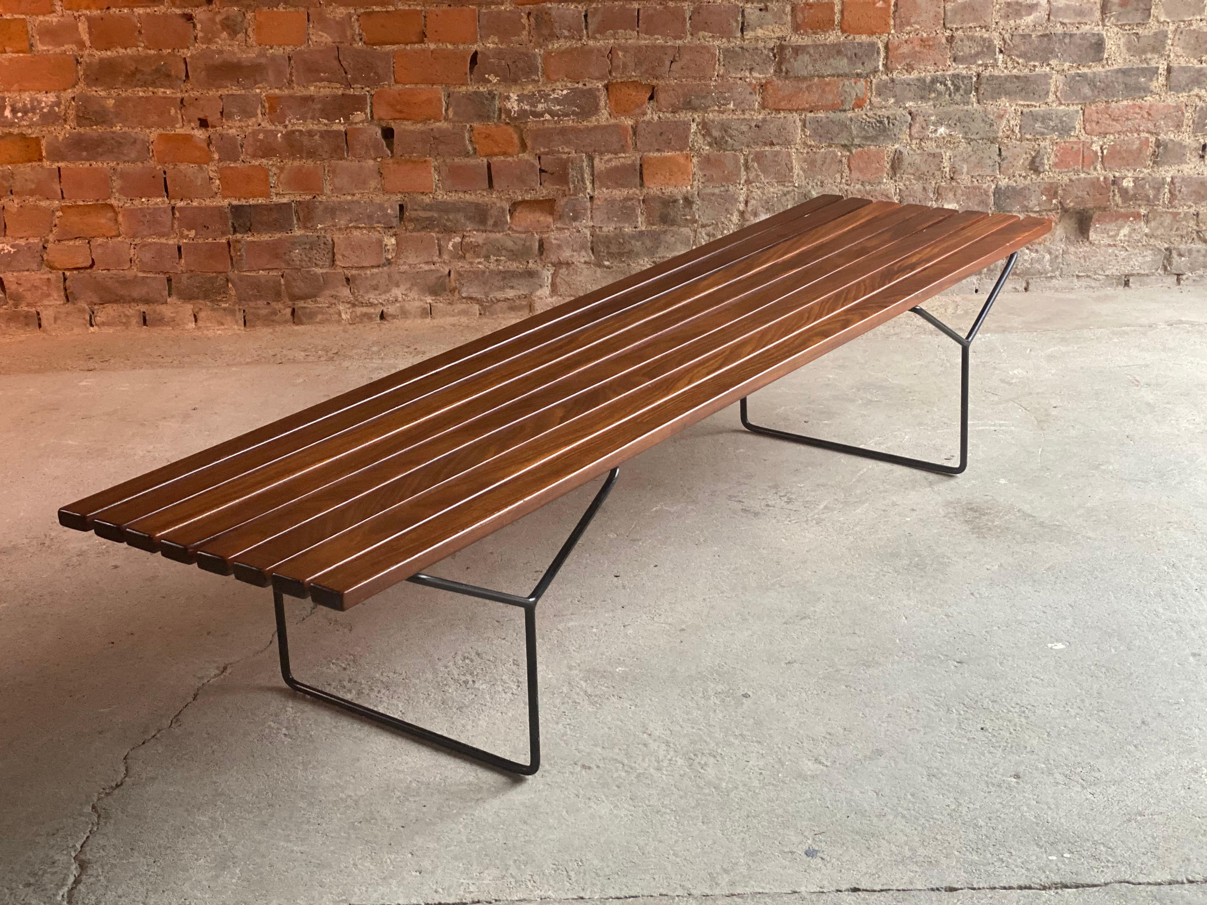 Midcentury Harry Bertoia bench by Knoll, circa 1960s

Magnificent original Bertoia bench for Knoll circa 1960s, the bench with eight teak slats raised on black coated legs, a true Bertoia Classic, can be used either as a bench or coffee