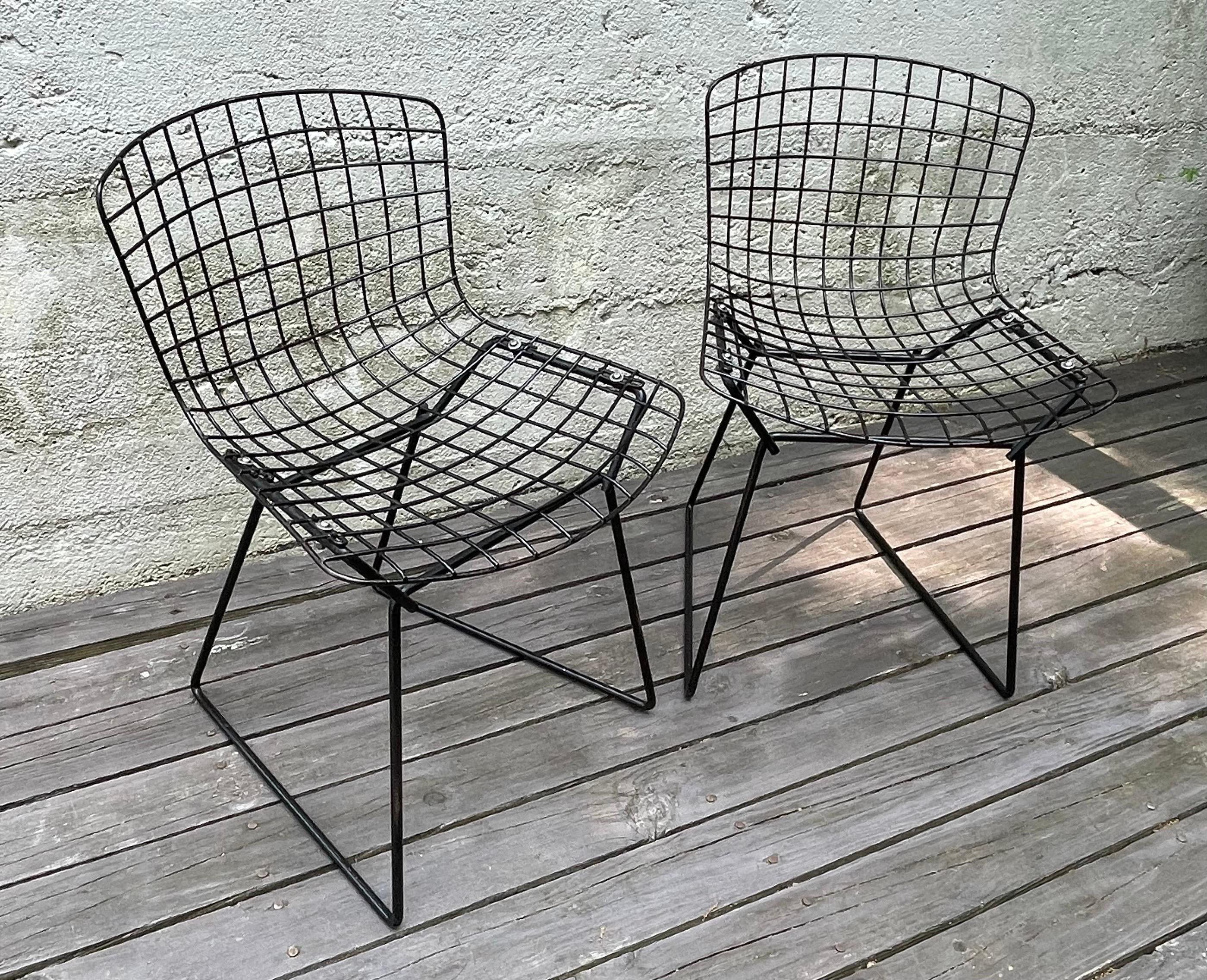 Iconic midcentury Harry Bertoia black wire mesh side chairs for Knoll International, children's Size, circa 1970.

Hans and Florence never insisted that Harry Bertoia design furniture when they originally gave him a studio in an early Knoll