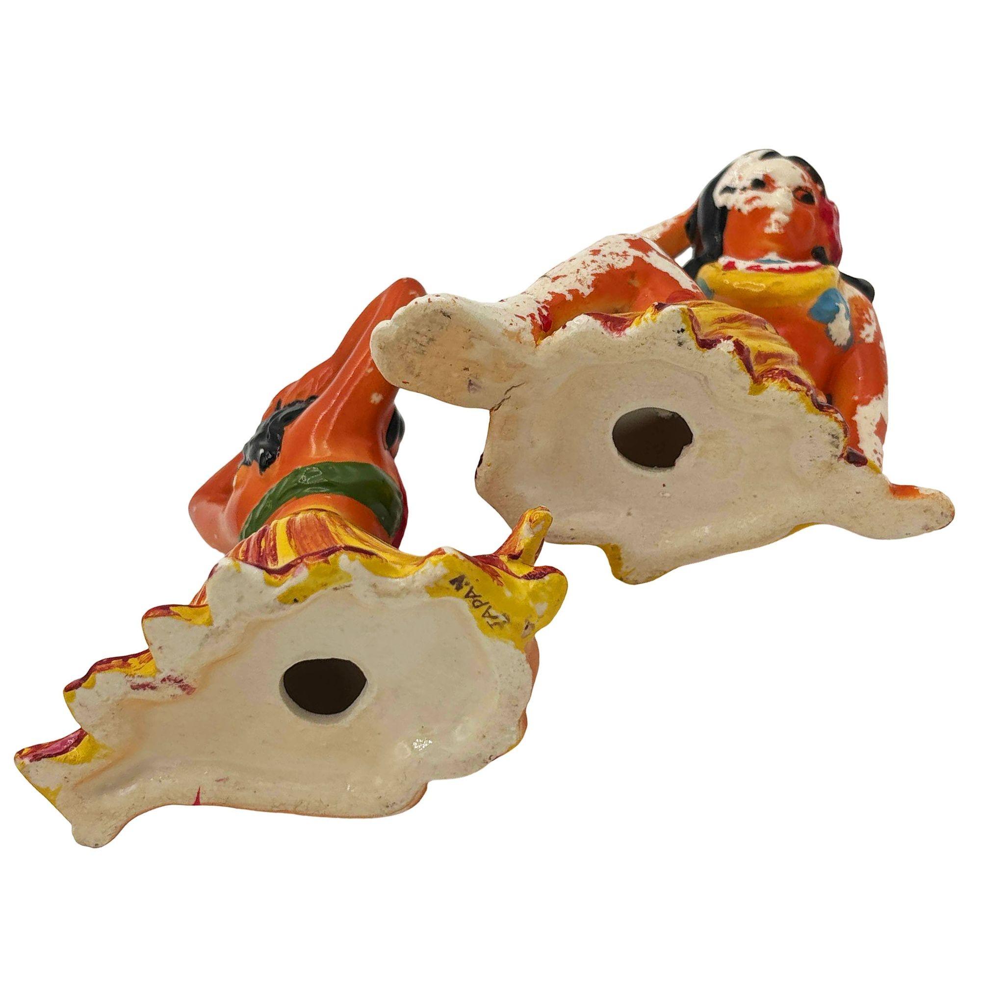 Américain Statue hawaïenne du milieu du siècle en céramique représentant une fille de la Hula assise, paire en vente