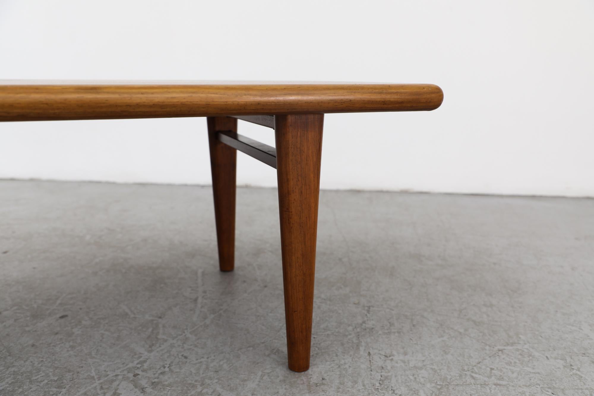 Mid-Century Heavy Danish Teak Coffee Table with Tapered Legs & Thick Rounded Top For Sale 6