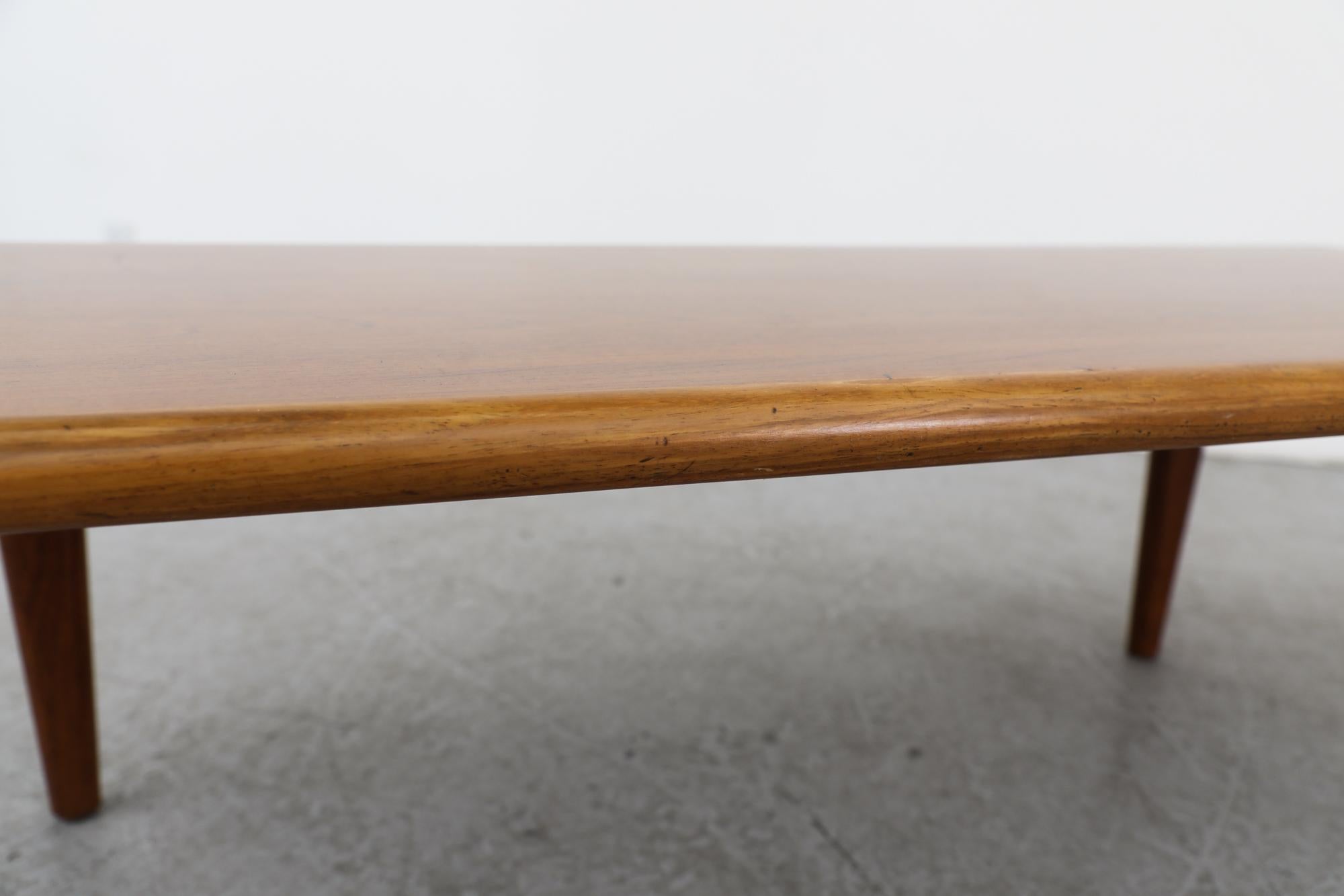 Mid-Century Heavy Danish Teak Coffee Table with Tapered Legs & Thick Rounded Top For Sale 7