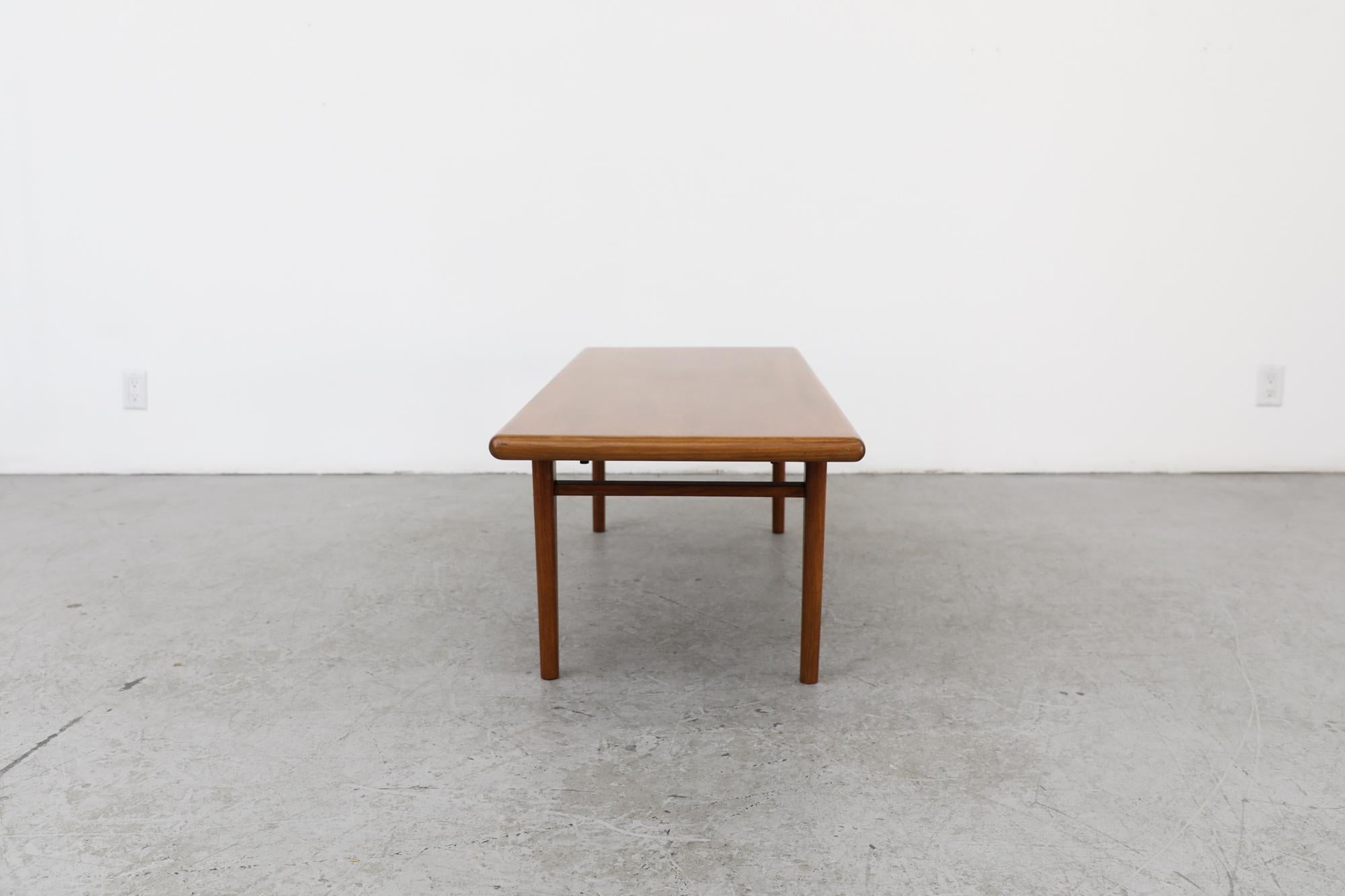 Mid-20th Century Mid-Century Heavy Danish Teak Coffee Table with Tapered Legs & Thick Rounded Top For Sale