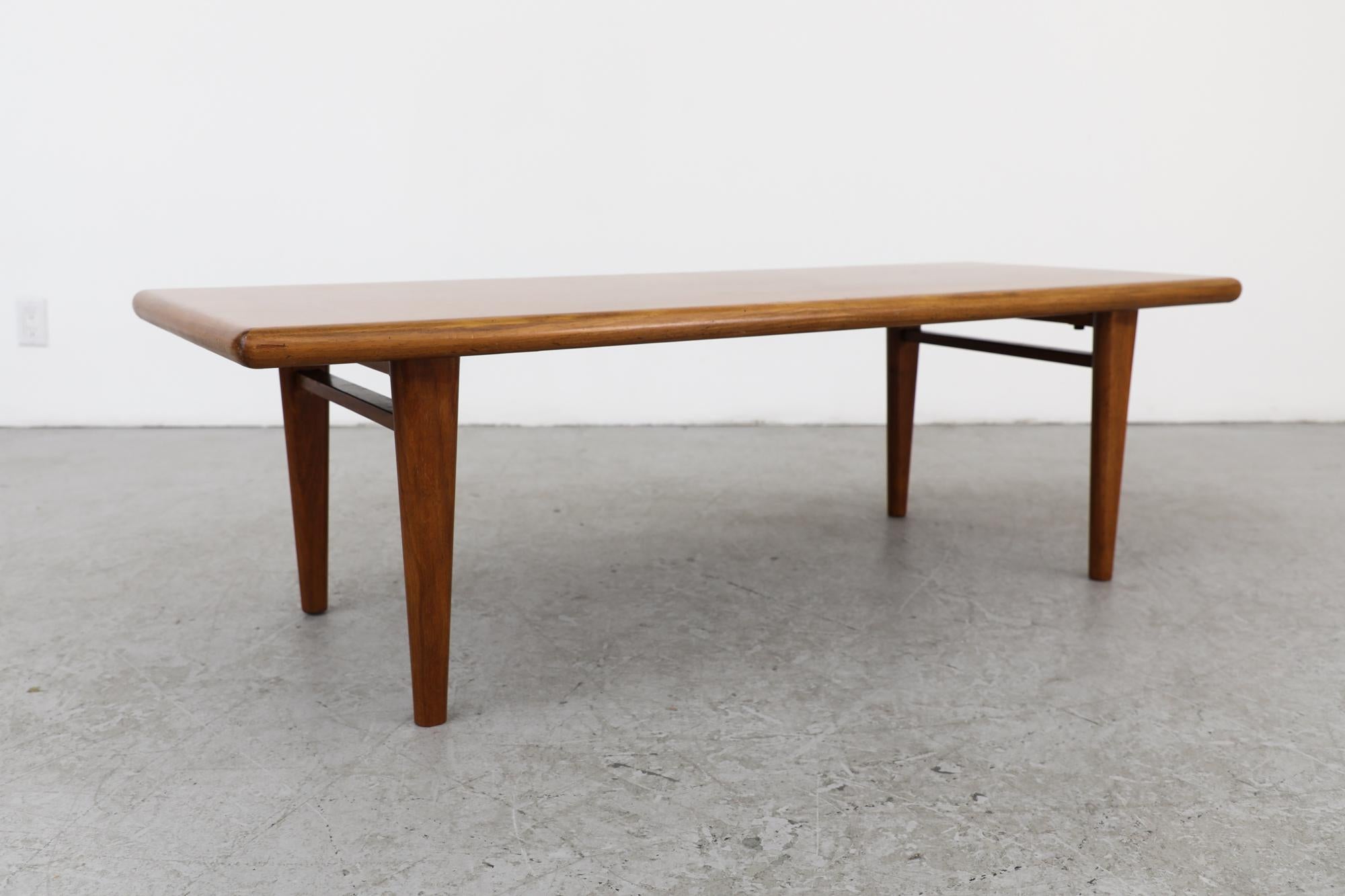 Mid-Century Heavy Danish Teak Coffee Table with Tapered Legs & Thick Rounded Top For Sale 1