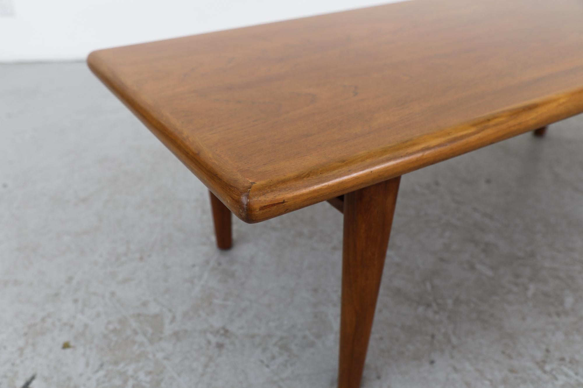 Mid-Century Heavy Danish Teak Coffee Table with Tapered Legs & Thick Rounded Top For Sale 3