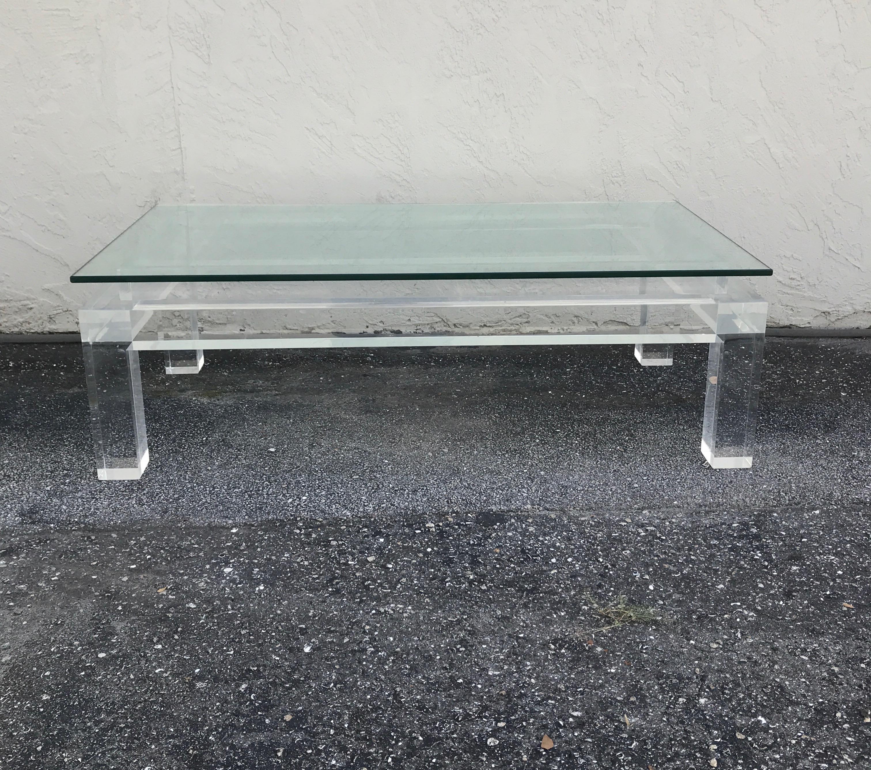 Mid century classical style heavy lucite cocktail table.