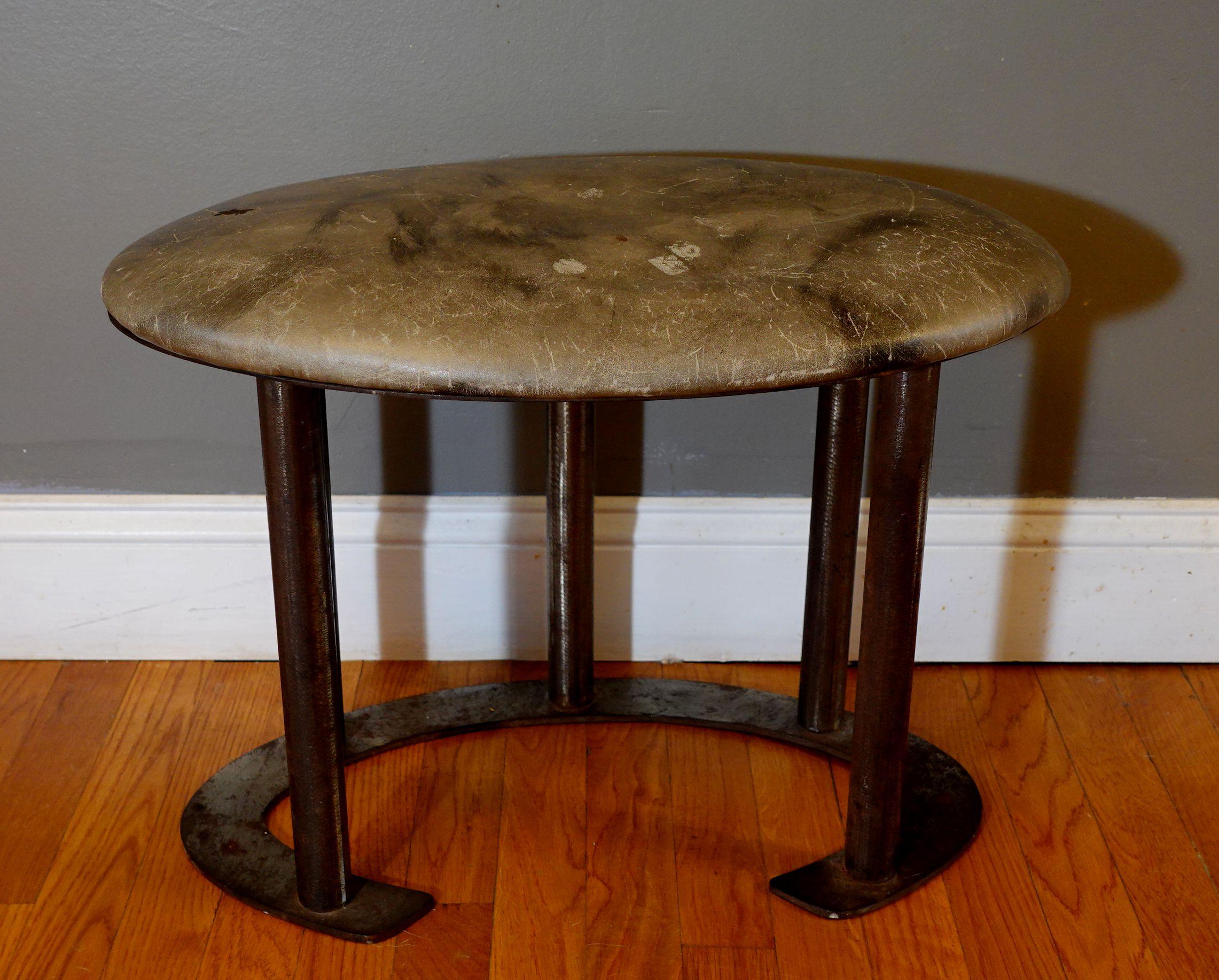 This is a stool with a heavy steel base, and the top seat is made of vinyl.
A unique piece from the mid-century, very unusual from the era, and very comfortable to seat.
Measures: 15 inches H, top 14