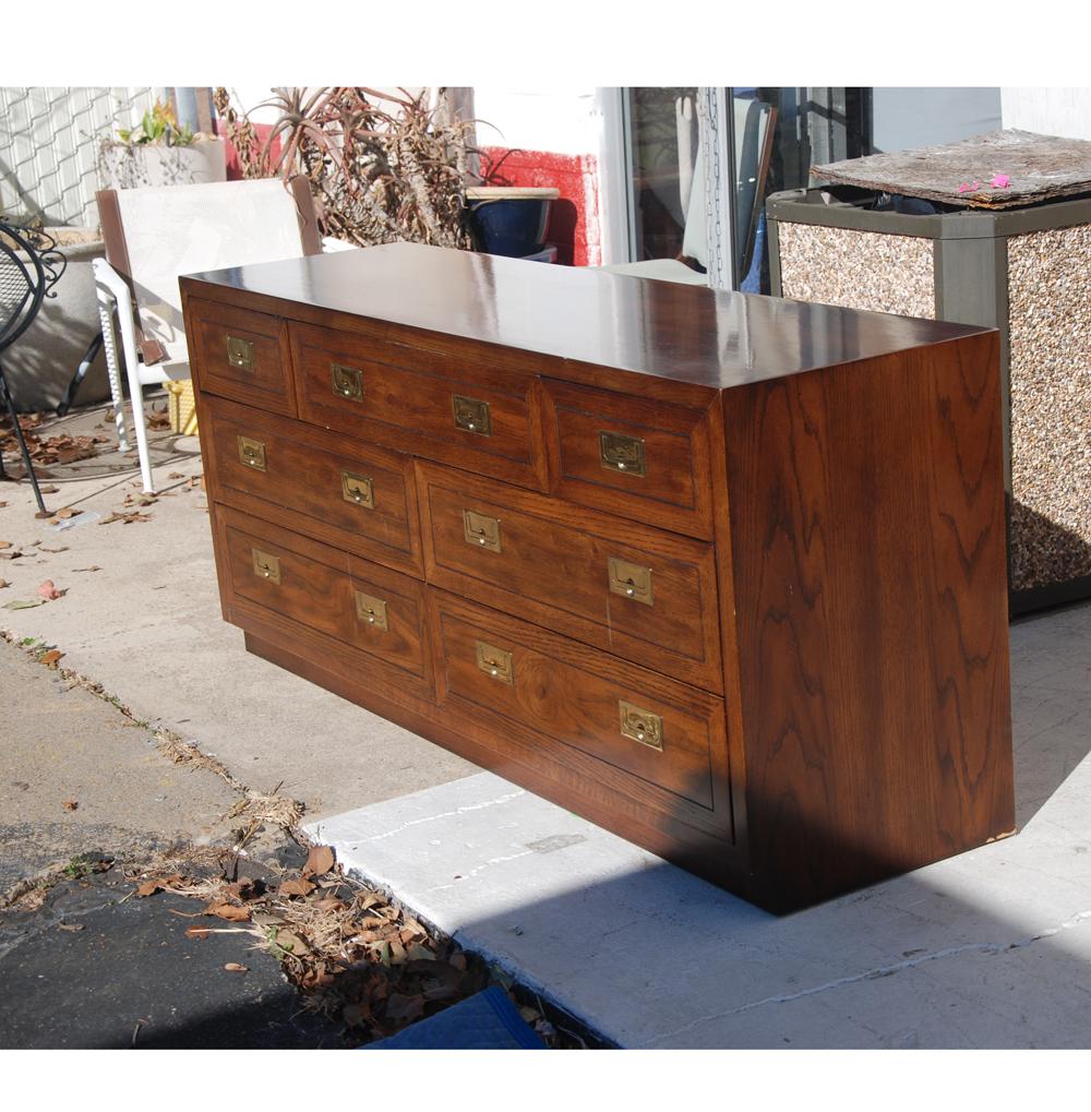 Mid Century Henredon Fine Furniture Scene One 1
Campaign Dresser Credenza

 
 Campaign dresser constructed of walnut with brass accents.
Seven drawers. 

see matching tall dresser