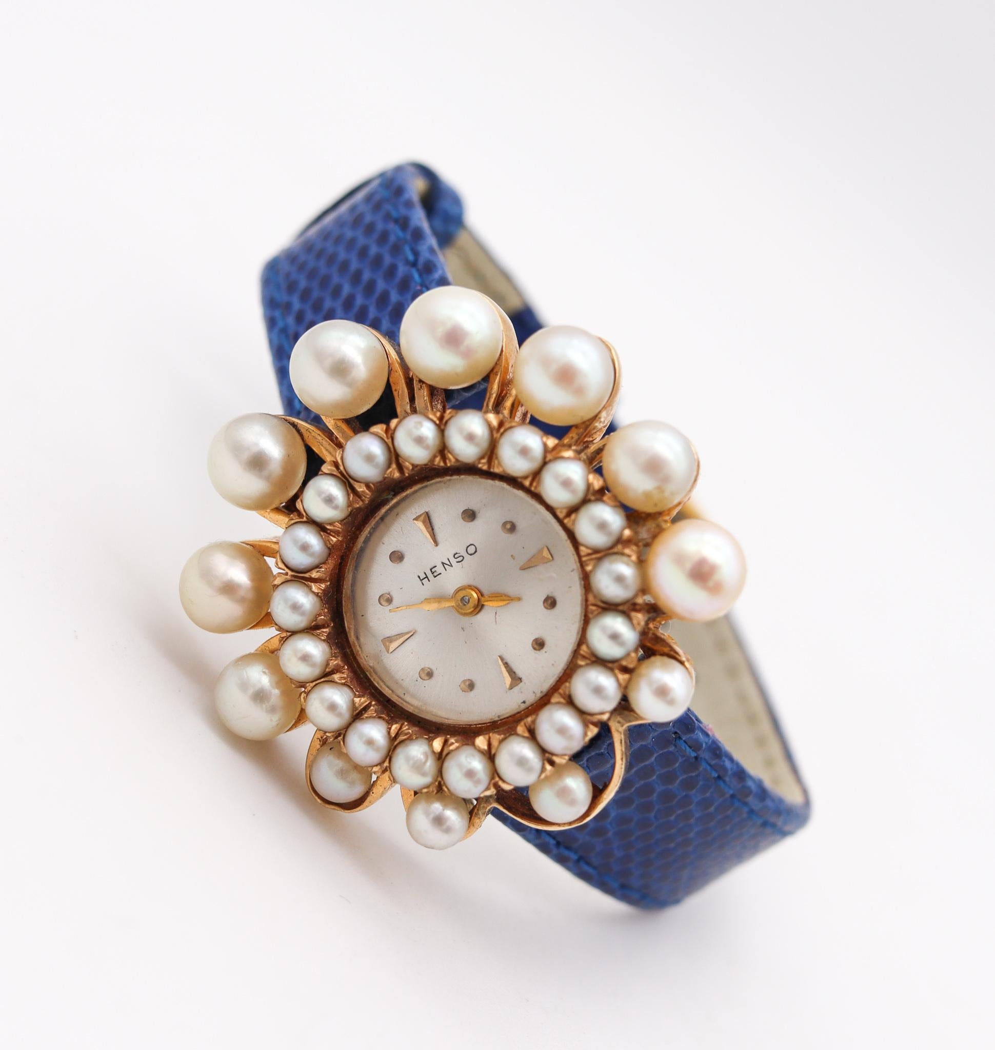 Modernist retro wristwatch designed by the Henso Watch Co.

Very elegant women wristwatch, created during the mid century period by the Henso Watch Co. This piece has a very terrific look with great eye appeal and was crafted in solid yellow gold of