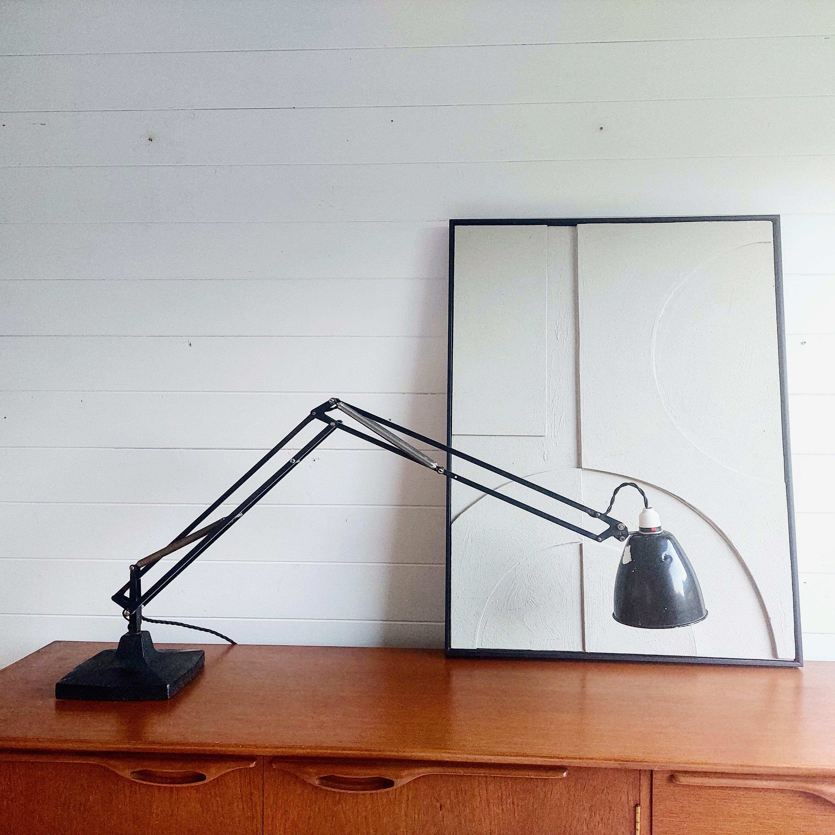 Made between 1933 and 1968, this is the iconic Model 1029 Anglepoise from Herbert Terry & Sons. 
Iconic design classics with heavy cast iron bases, original black paintwork, chrome springs & fittings & tulip shades.
Good, untouched & exceptionally