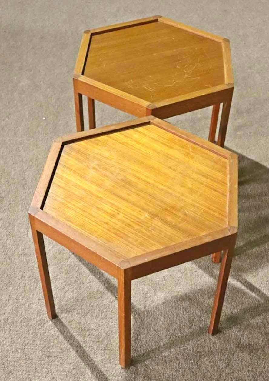 Pair of Mid-Century Modern teak tables with hexagon shape. Great for serving or as plant stands.
Please confirm location.