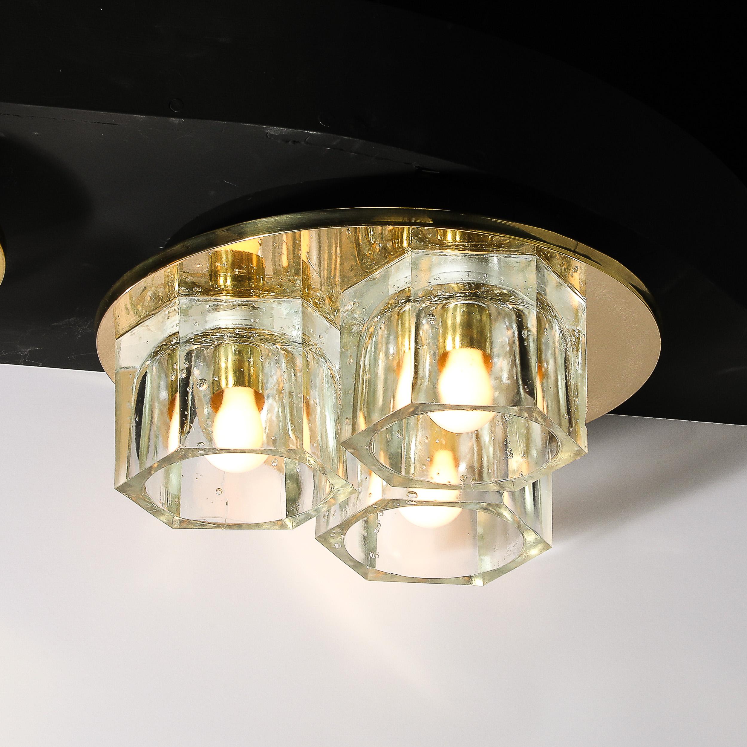 This lovely Mid-Century Modernist Hexagonal Three Shade Glass Flush Mount Chandelier W/Brass Fittings is by Lightolier and originates from the United States, Circa 1970. Features three hexagonal glass shades which house and diffuse the light of the