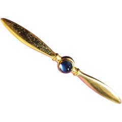Mid-Century Hickok USA Gold-Tone Bar Brooch with Blue Cabochon Center