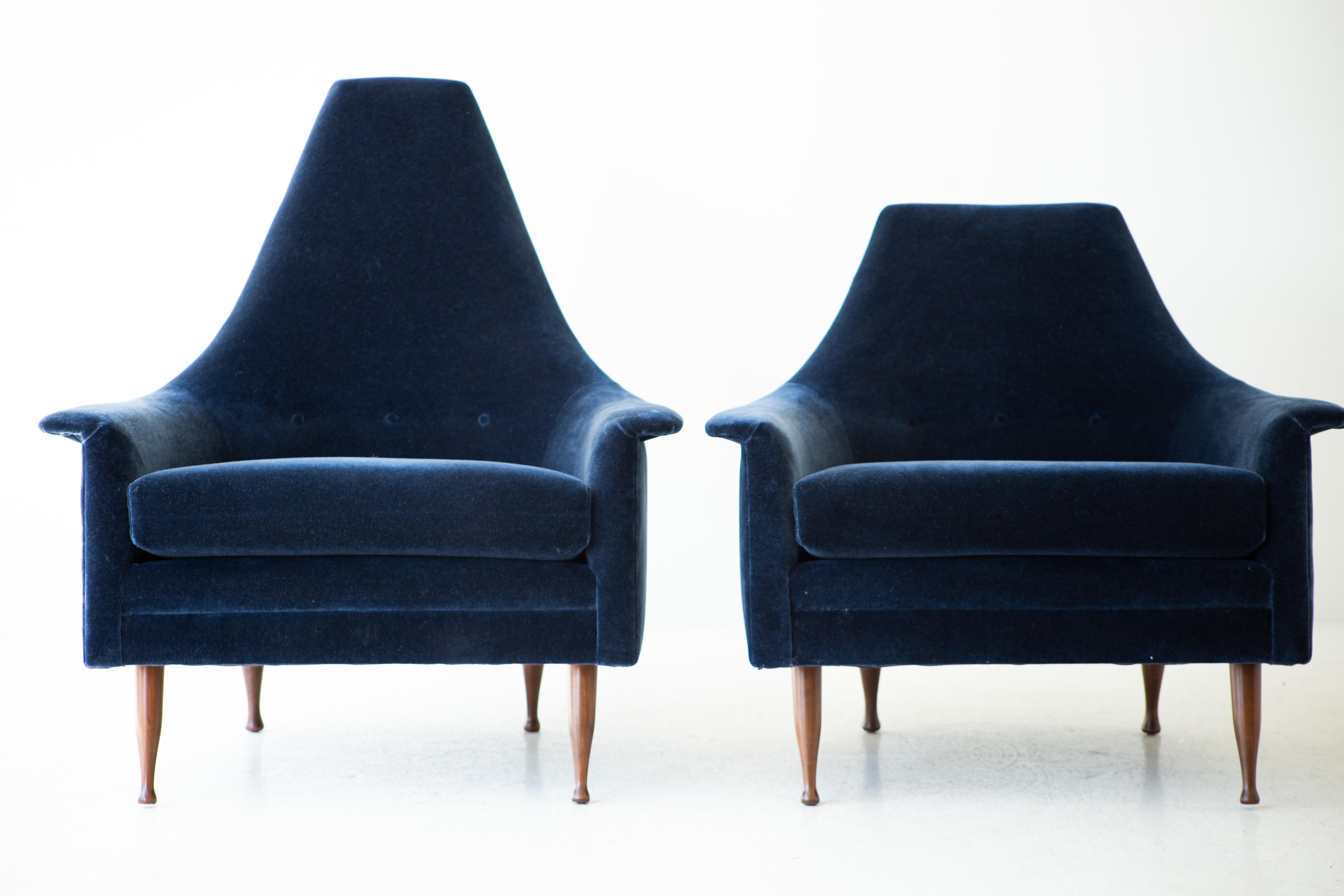 Designer: Unknown (executed under creative director Finn Anderson). 

Manufacturer: Selig Manufacturing. 
Period/Model: Mid-Century Modern. 
Specs: Walnut, Navy Mohair. 

Condition: 

These mid century high back and Low back lounge chairs