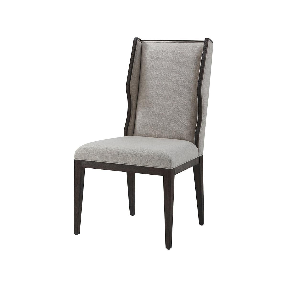with a dark cardamon finish textured beech frame, a high back winged backrest and upholstered in performance fabric.

Dimensions: 22
