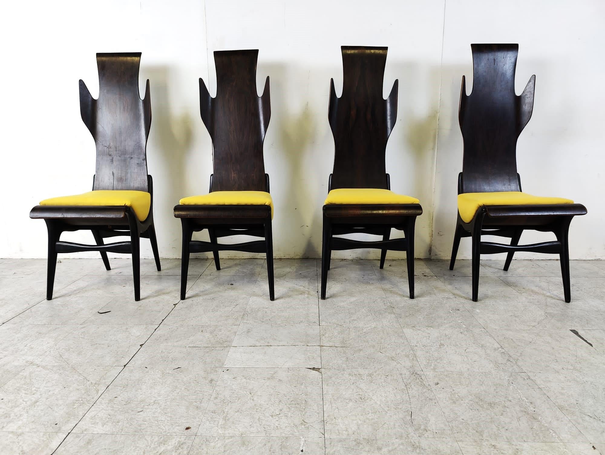Exceptional mid century 'flame' dining chairs designed by Dante Latorre for Pozzi and Verga.

The chairs are made of rosewood plywood with original mustard yellow cushions.

The reason why they are called flame chairs is obvious.

These are very