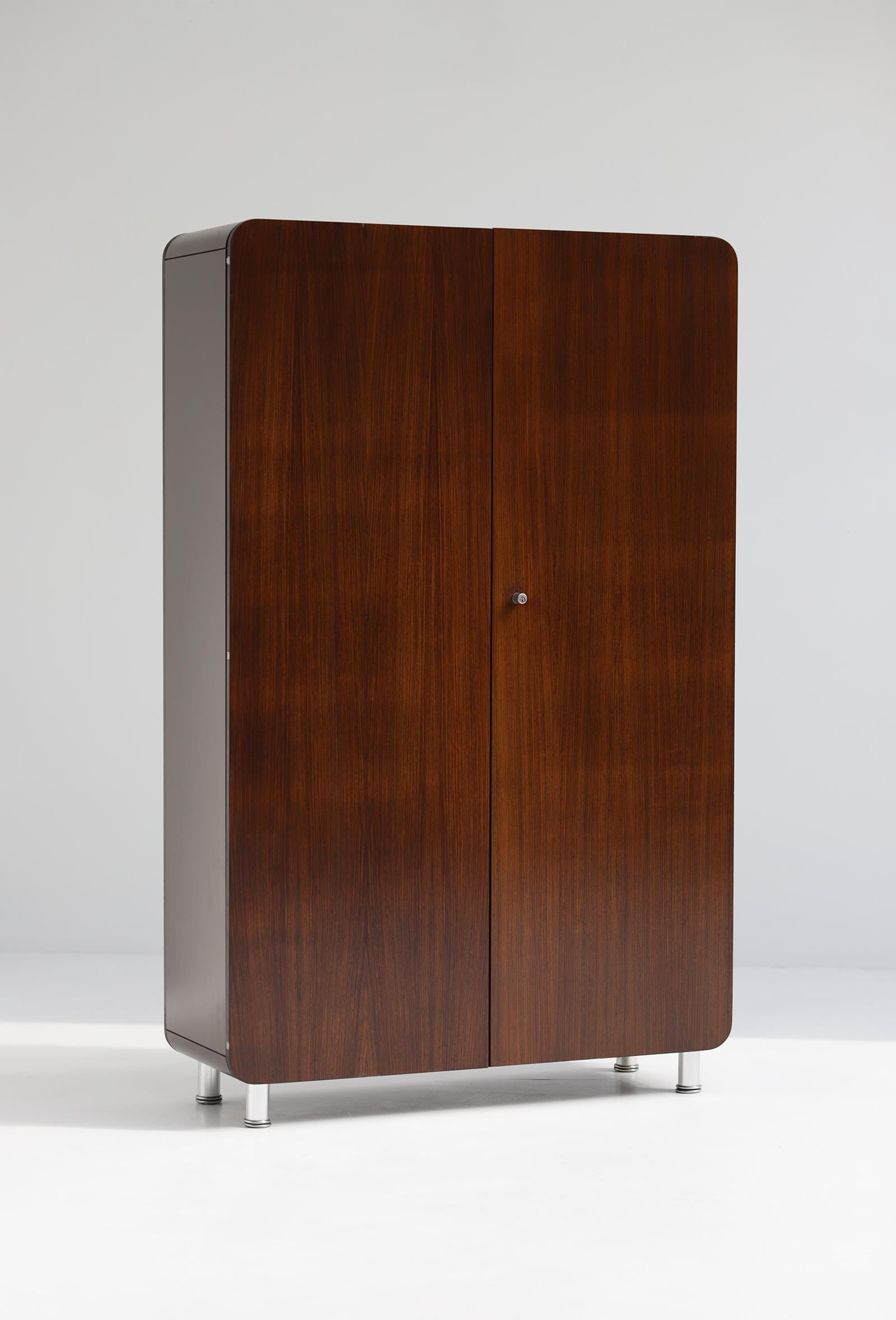 High cabinet produced by the Belgian company Bergwood in the 1970s. Bergwood is known for its productions of Jules Wabbes. Based on sketches that are published in the book ‘Jules Wabbes - Interior Architect’ it is not clear how this design went