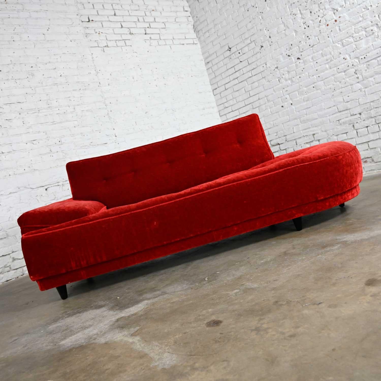 Gorgeous Mid Century 1950’s Hollywood Regency or Art Deco style crushed red velvet chaise lounge with wood legs. Beautiful condition, keeping in mind that this is vintage and not new so will have signs of use and wear. Legs have been newly painted