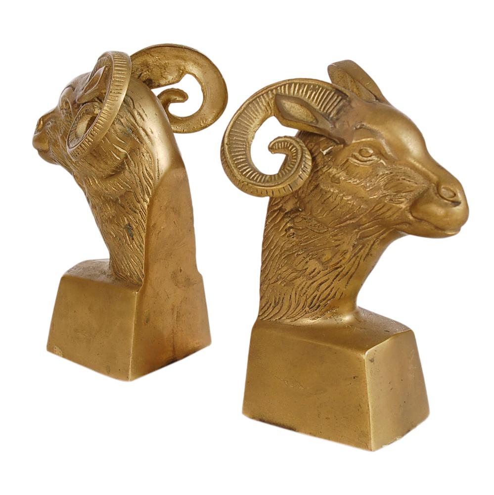 A heavy solid brass pair of ram's head book ends circa 1960s. Probably Italian or French. Nice warm patina.