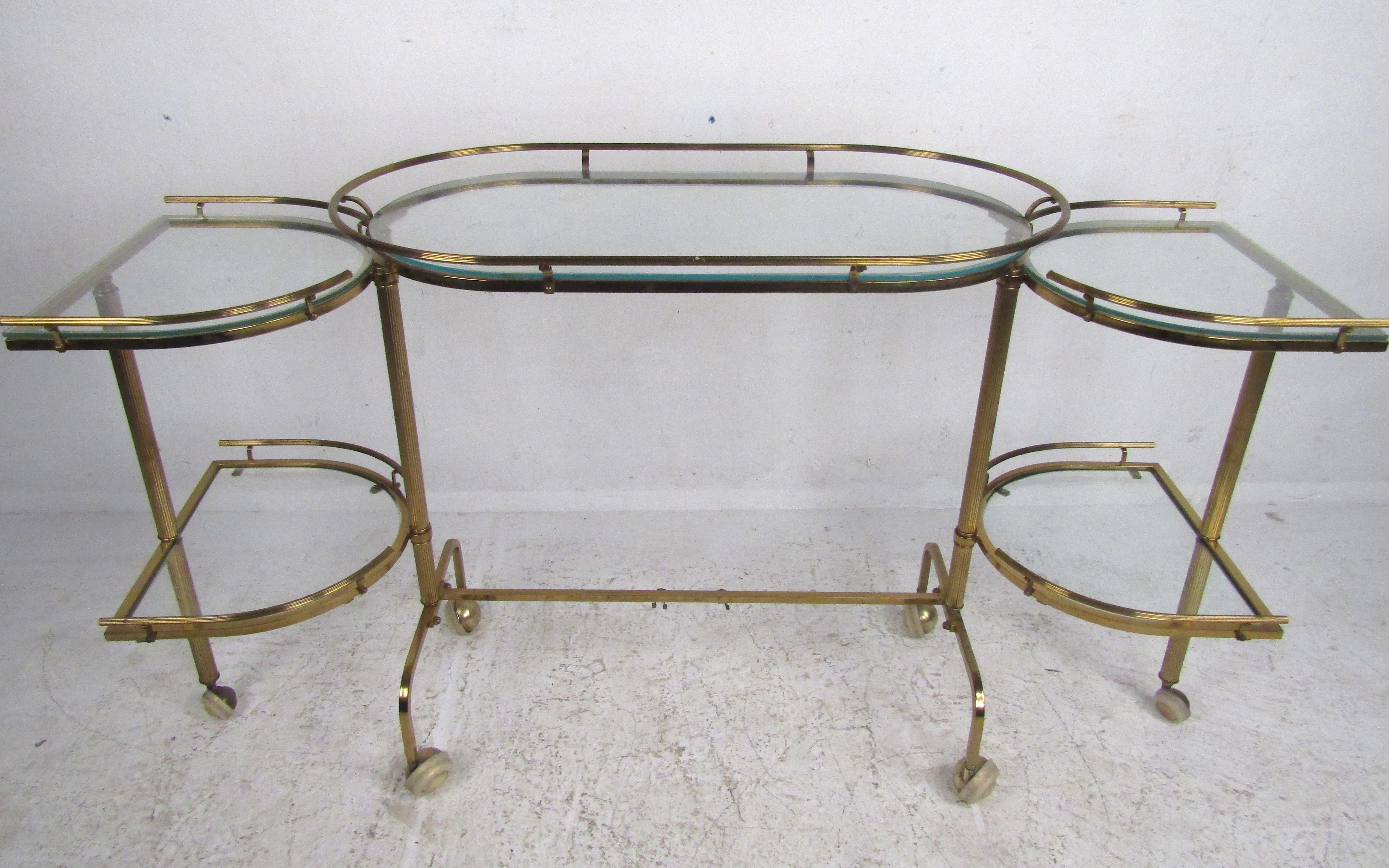 Late 20th Century Midcentury Hollywood Regency Brass Swivel Bar Cart