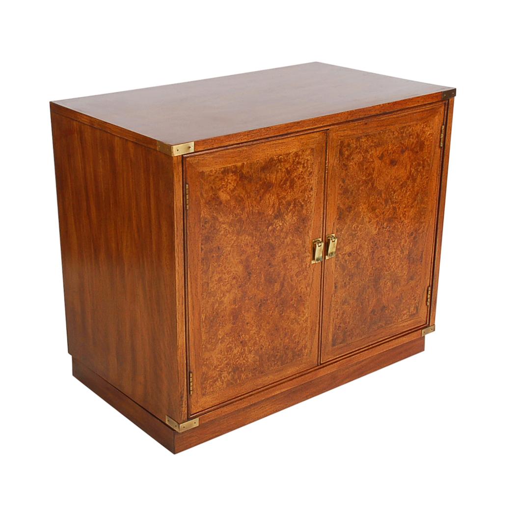 A very nice matching pair of burl cabinets that would make great oversized nightstands. They feature solid wood construction, with burl veneer door fronts, brass accents and interior shelf.