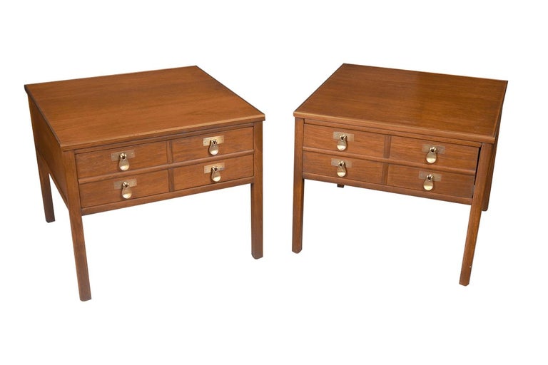 An exceptional pair of Hollywood Regency Campaign style Mid-Century Modern, side tables/night stands by Imperial Furniture, circa early 20th century. These absolute jewels remain in nearly pristine condition. The lines are clean and elegant.