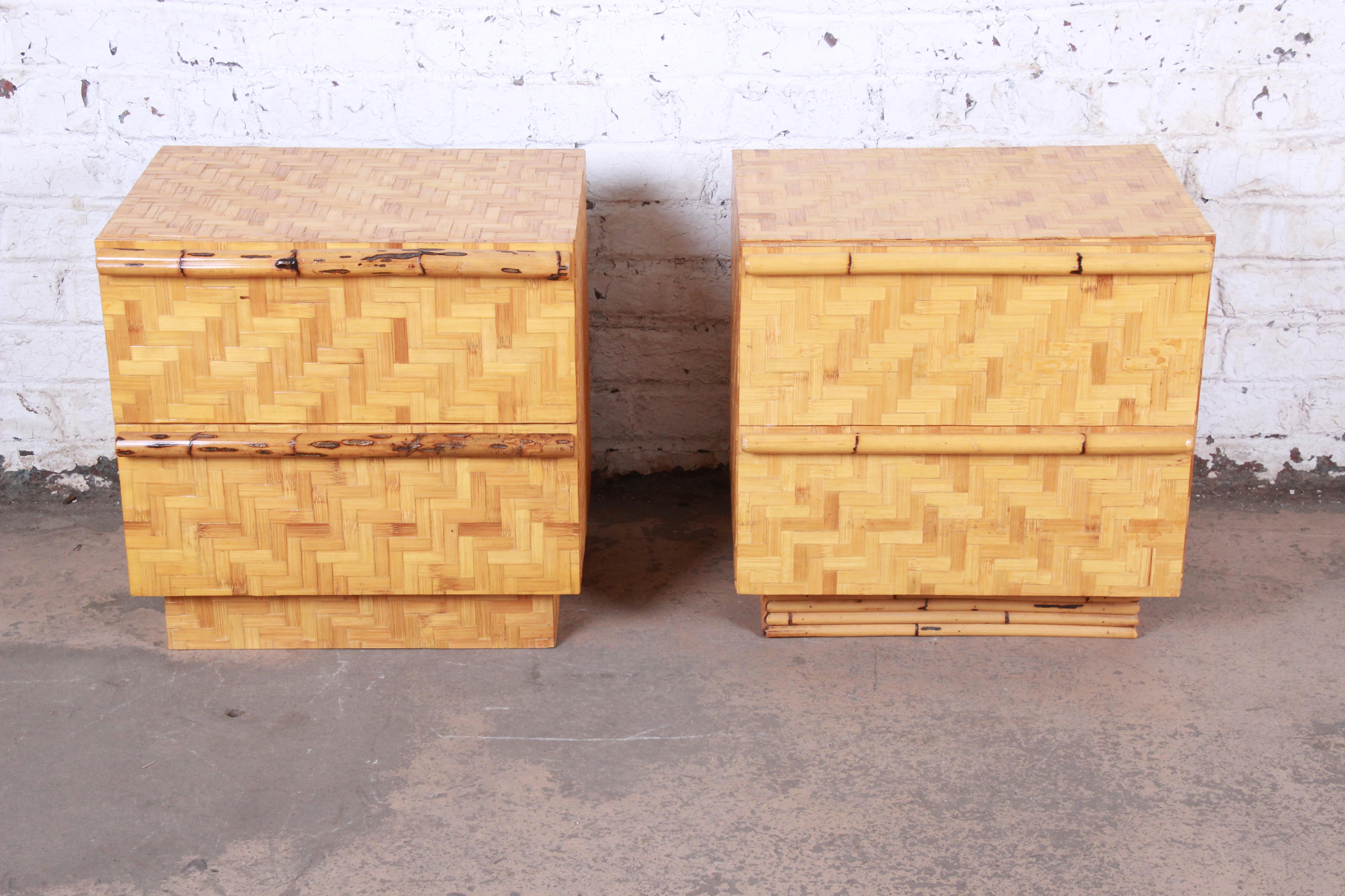 A gorgeous pair of Mid-Century Modern Hollywood Regency chinoiserie bamboo parquetry two-drawer nightstands or end tables

In the manner of Ficks Reed

USA, circa 1970s

Measures: 24.25