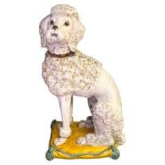 Mid-Century Hollywood Regency Era Italian Terracotta Poodle Figurine on Pillow