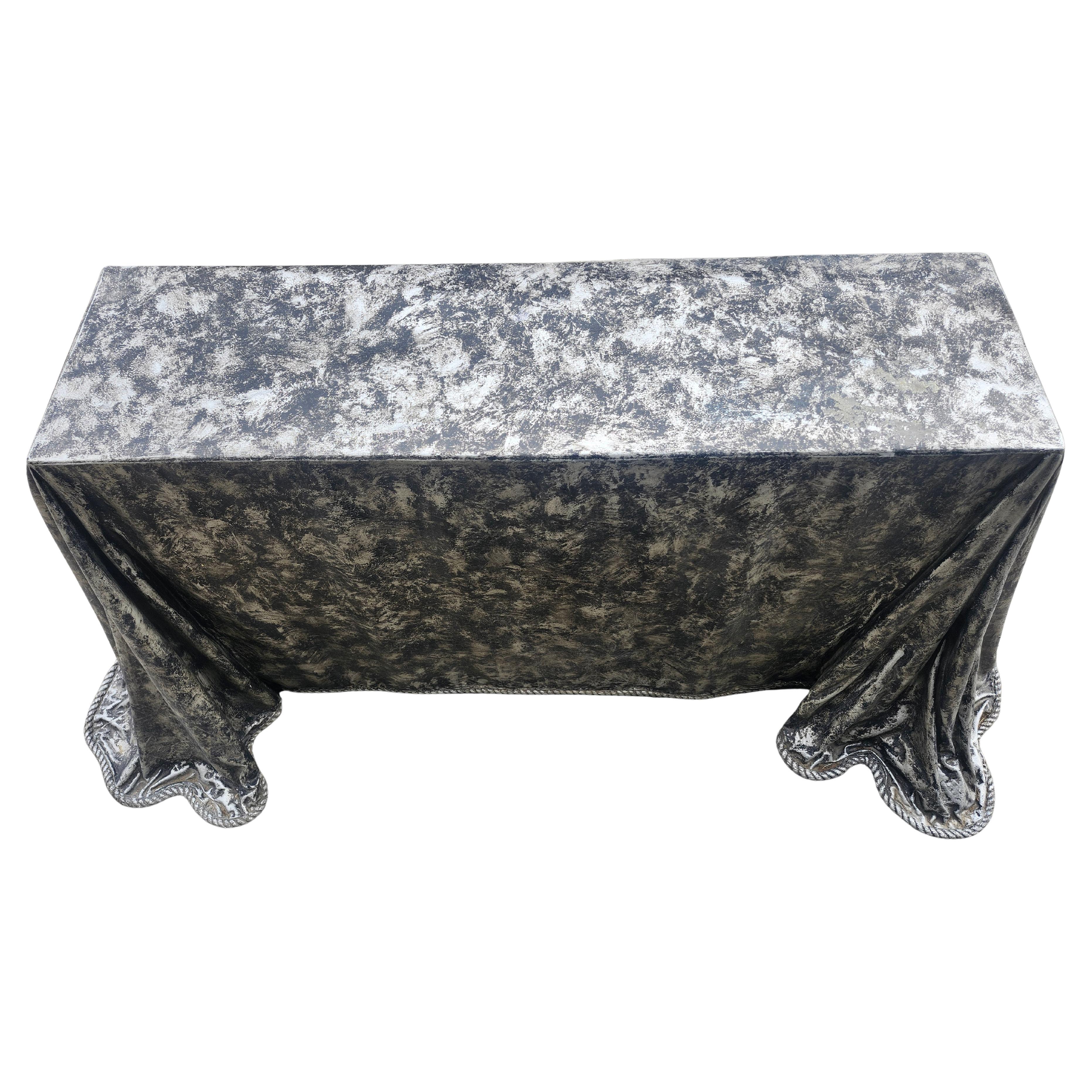 Spectacular creation of a faux draper console or center or sofa table made from fiberglass. Fantastic cast molded draped table with very dramatic corners where the draped materials creases and folds like its the real deal. Its finished on all sides
