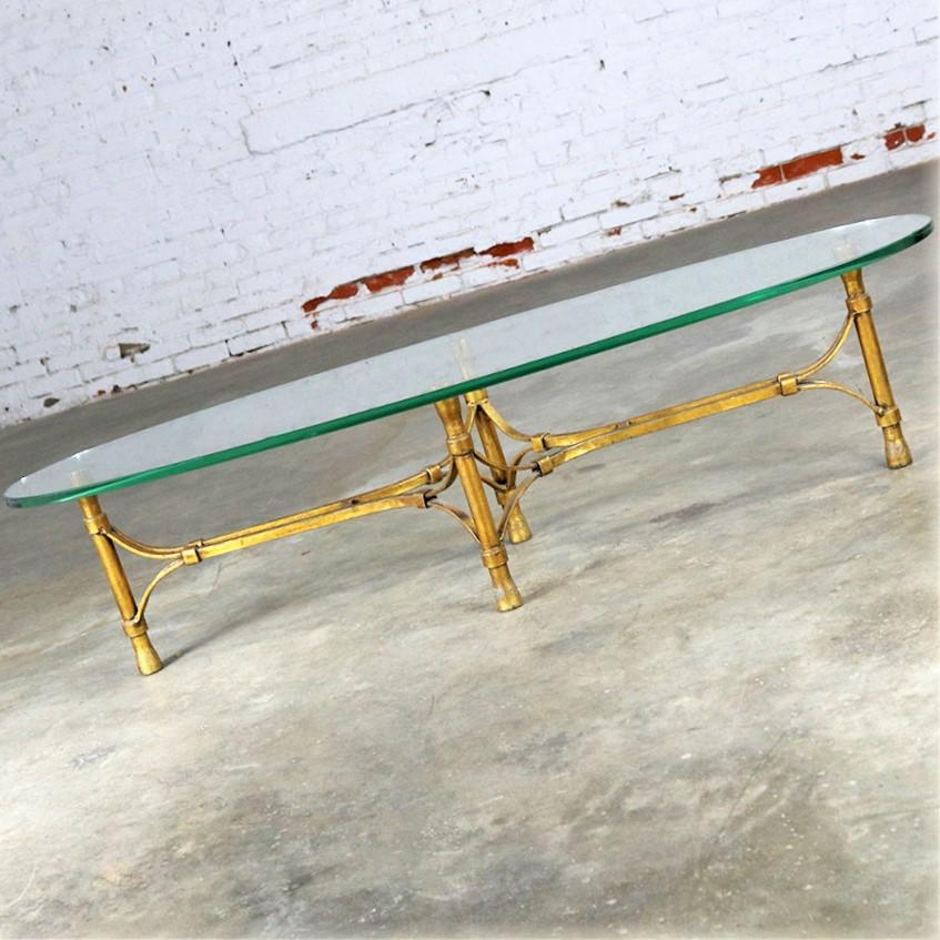 Mid Century Hollywood Regency Gilt Iron Base Coffee Table with Elliptical Glass  In Good Condition In Topeka, KS