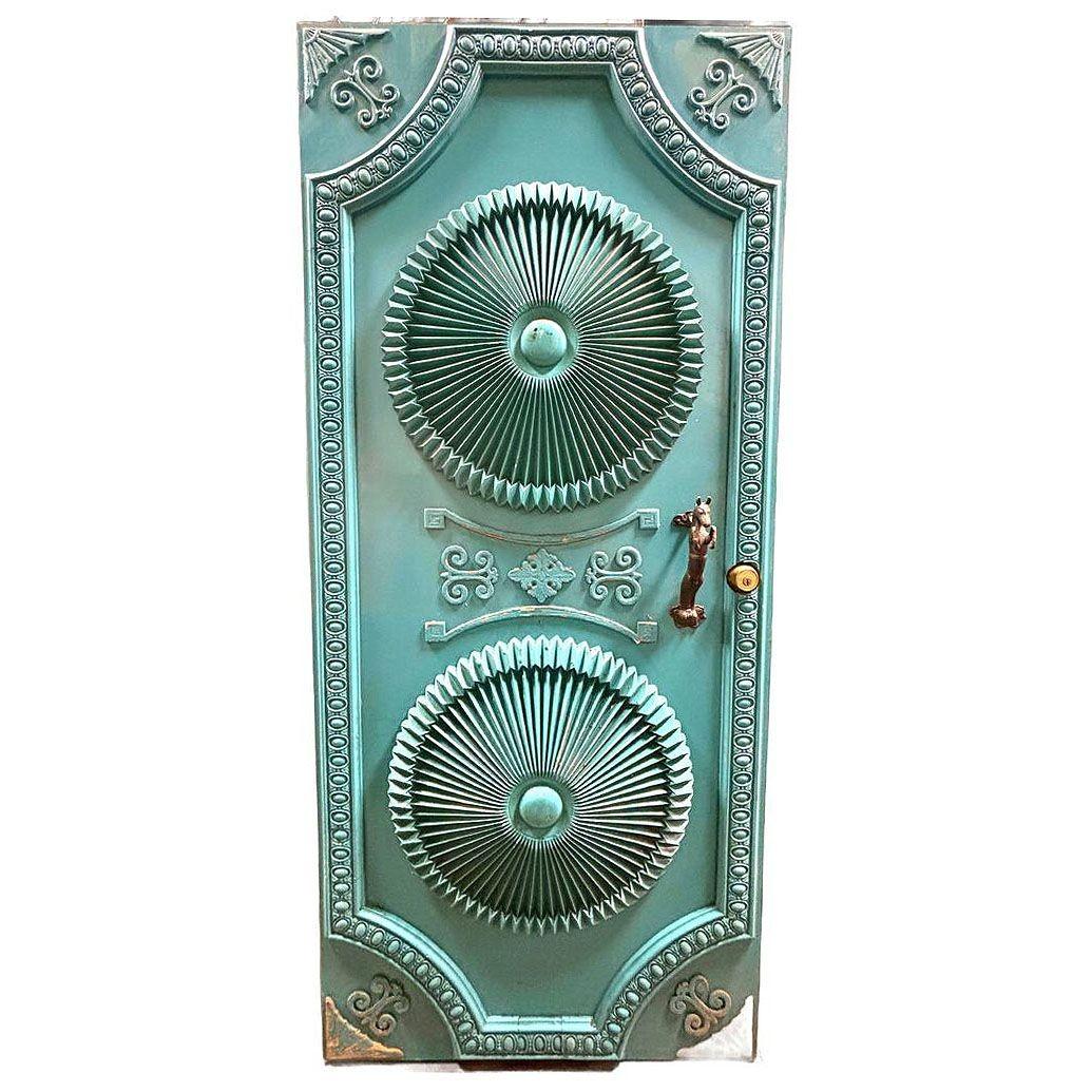 Original custom-made Mid-century era Hollywood Regency Grand Turquoise oak door, featuring an intricate design center, Majolica border, and decorative arrow corners. The door comes with matching bronze horse and tiger door handles. Handcrafted to