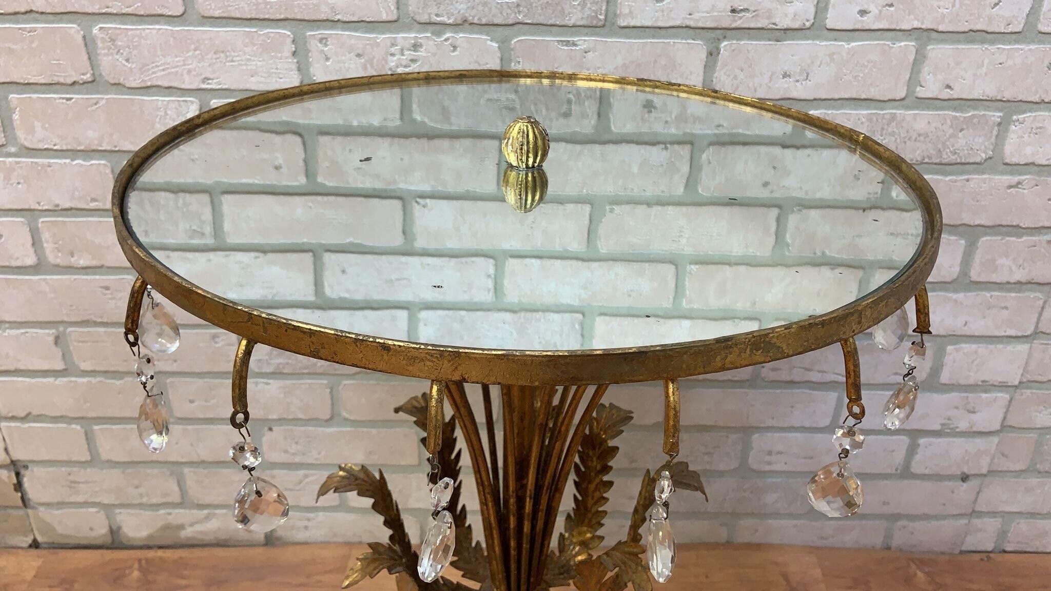 Mid Century Hollywood Regency Italian Gilt Accent Table with Mirrored Top 

This exquisite mid century Hollywood Regency Italian gilt accent table with mirrored top exudes elegance and sophistication. The vintage shabby chic design, adorned with