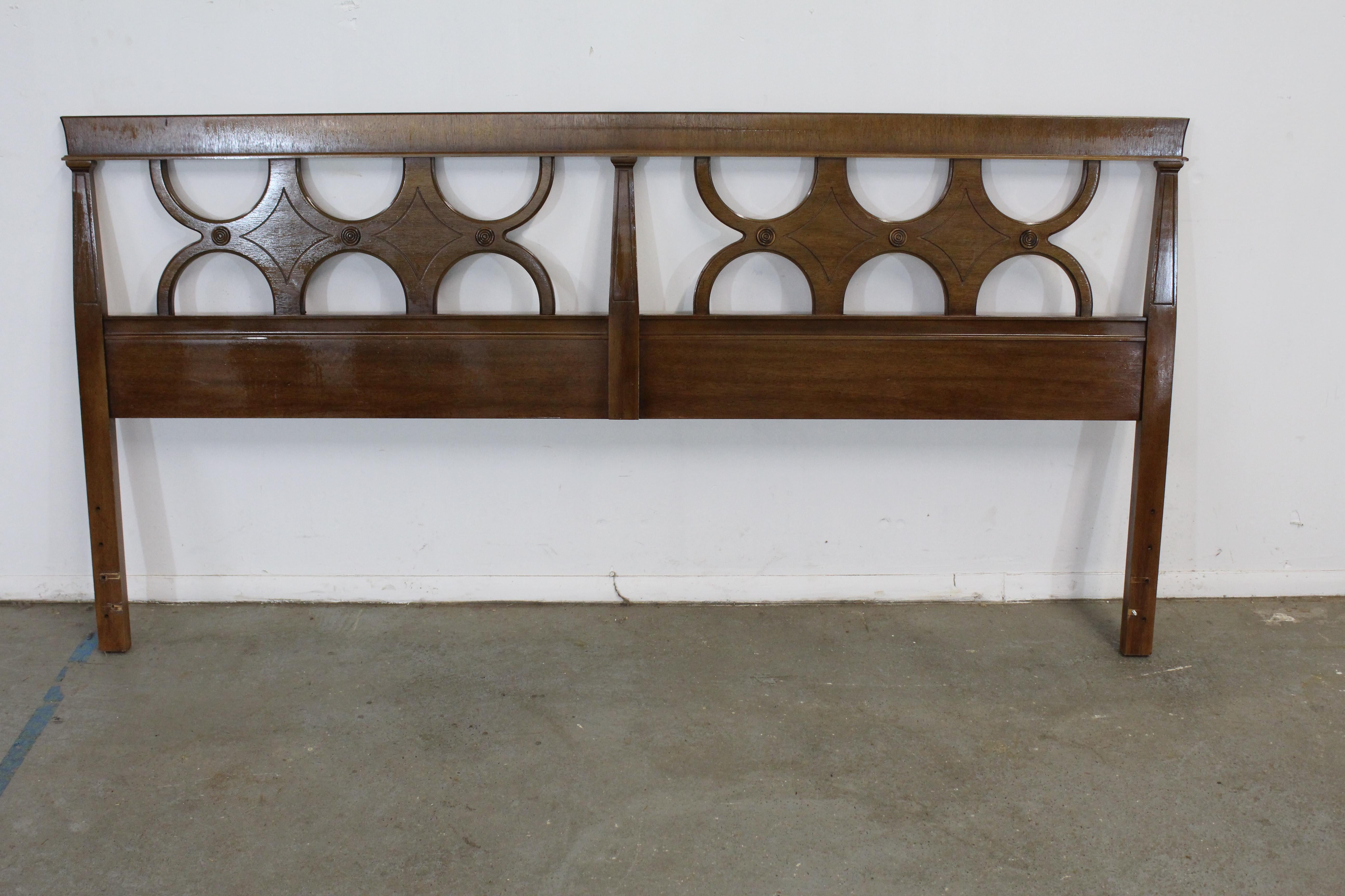 Mid-century Regency king size headboard

Offered is a vintage Mid-Century Modern king size headboard. Looks to be walnut or maybe Pecan, featuring signature rectangular relief patterns adorning the front. It is in very good, structurally sound