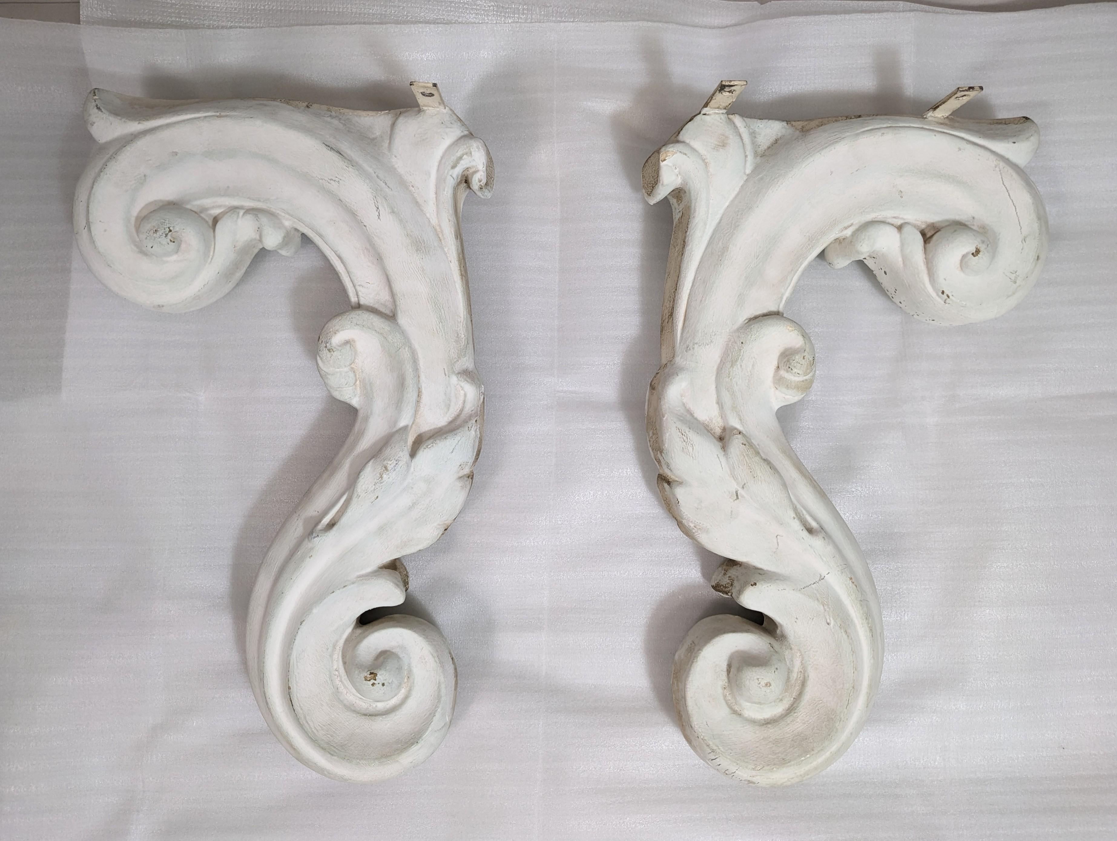 Pair of Elegant Mid Century Hollywood Regency Plaster Brackets in the Dorothy Draper style from the 1940's. Just needs a marble top to become an elegant shelf. 
17