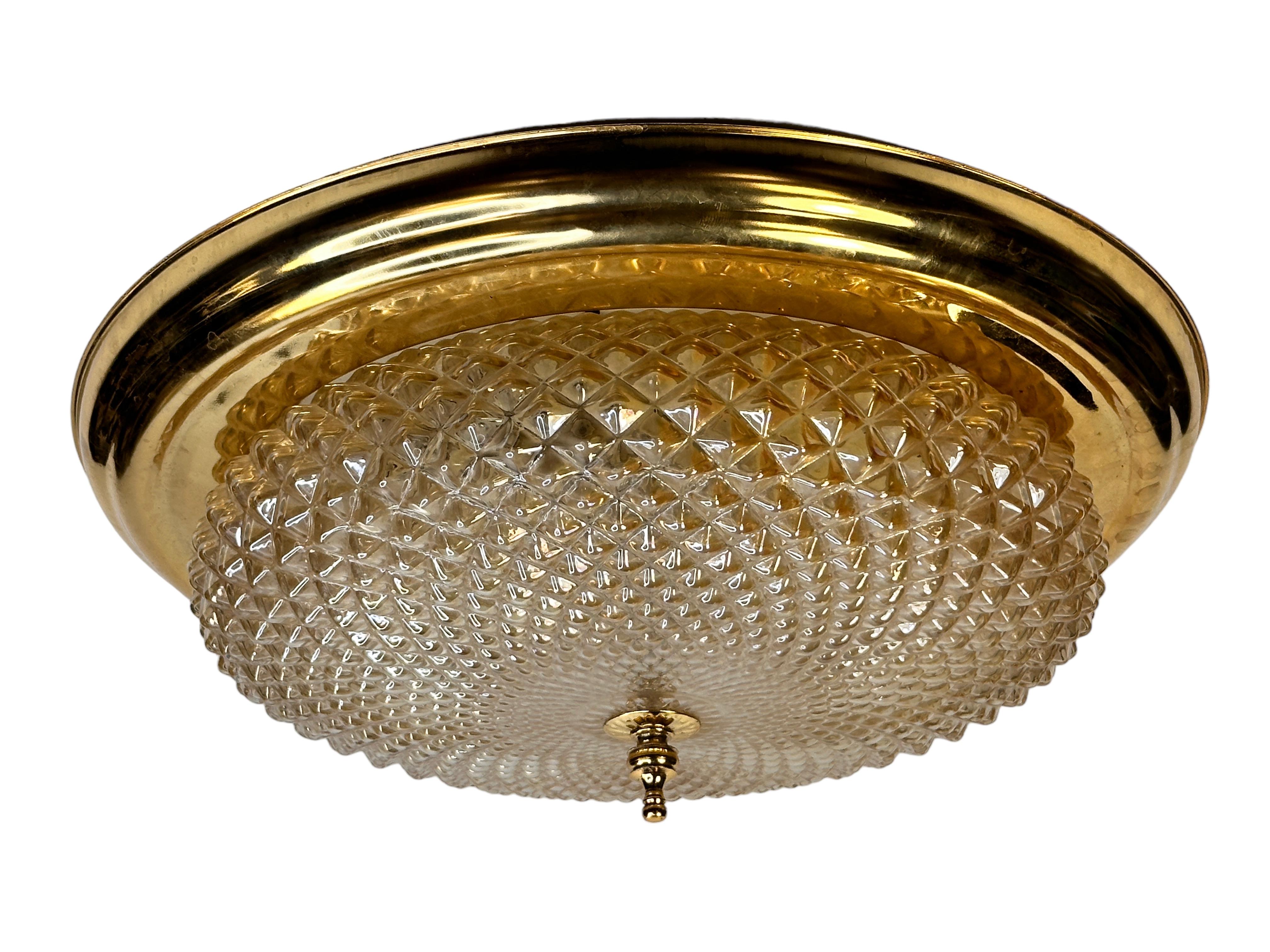 German Mid Century Hollywood Regency Style Flush Mount textured Amber Glass and Brass For Sale