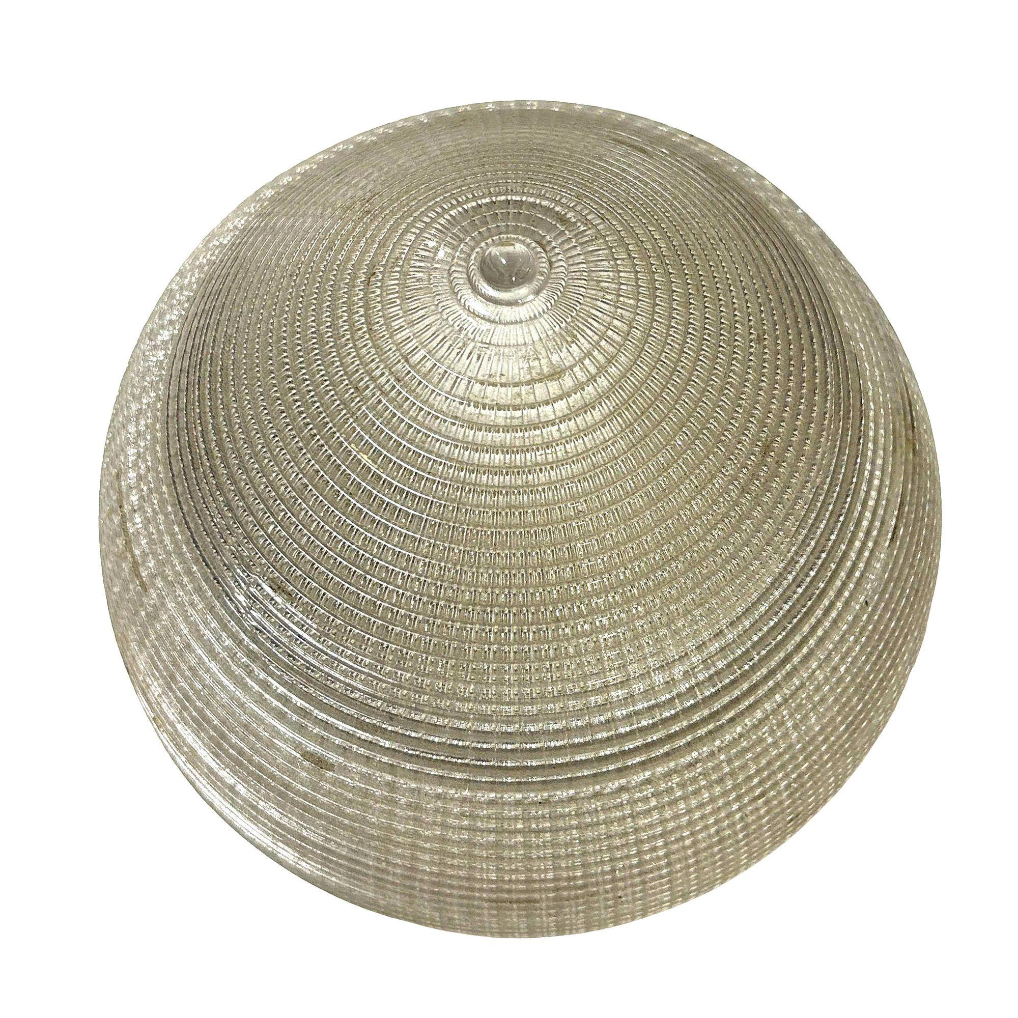 Mid-century era Holophane ceiling light features a distinctive teardrop-shaped glass globe. Its prismatic design diffuses light beautifully. A warm, aged brass fitter secures the globe, adding classic elegance to any space, Modern or
