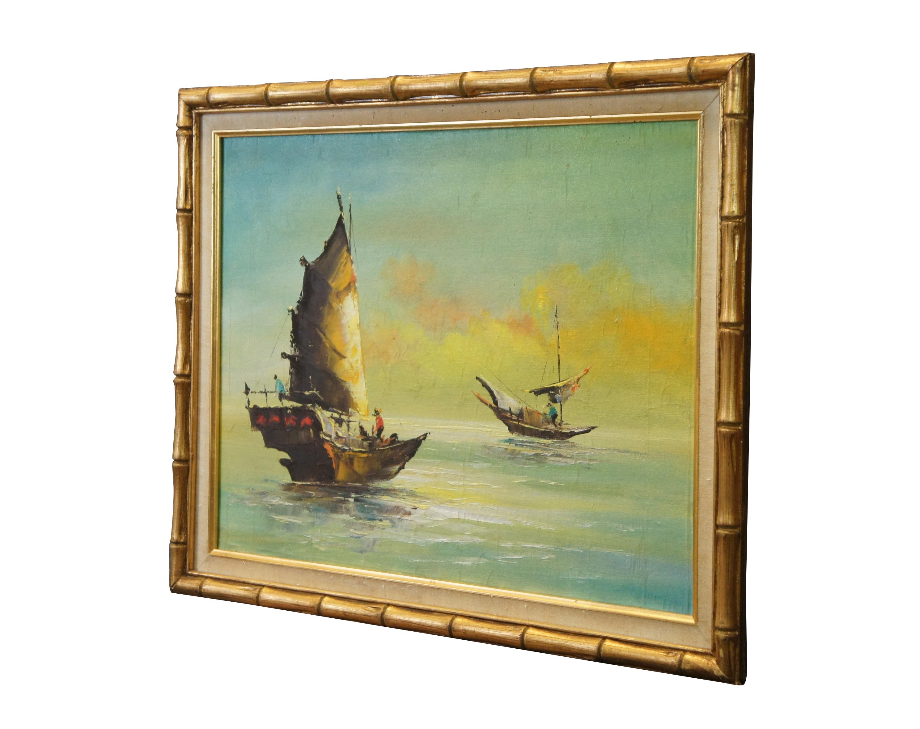 Circa mid 20th century Hong Kong maritime oil painting on canvas depicting a blue and gold seascape of Chinese fishing boats and figures on calm water. Faux bamboo gilt wood frame with linen border / mat. Mail Order address stamp on back of