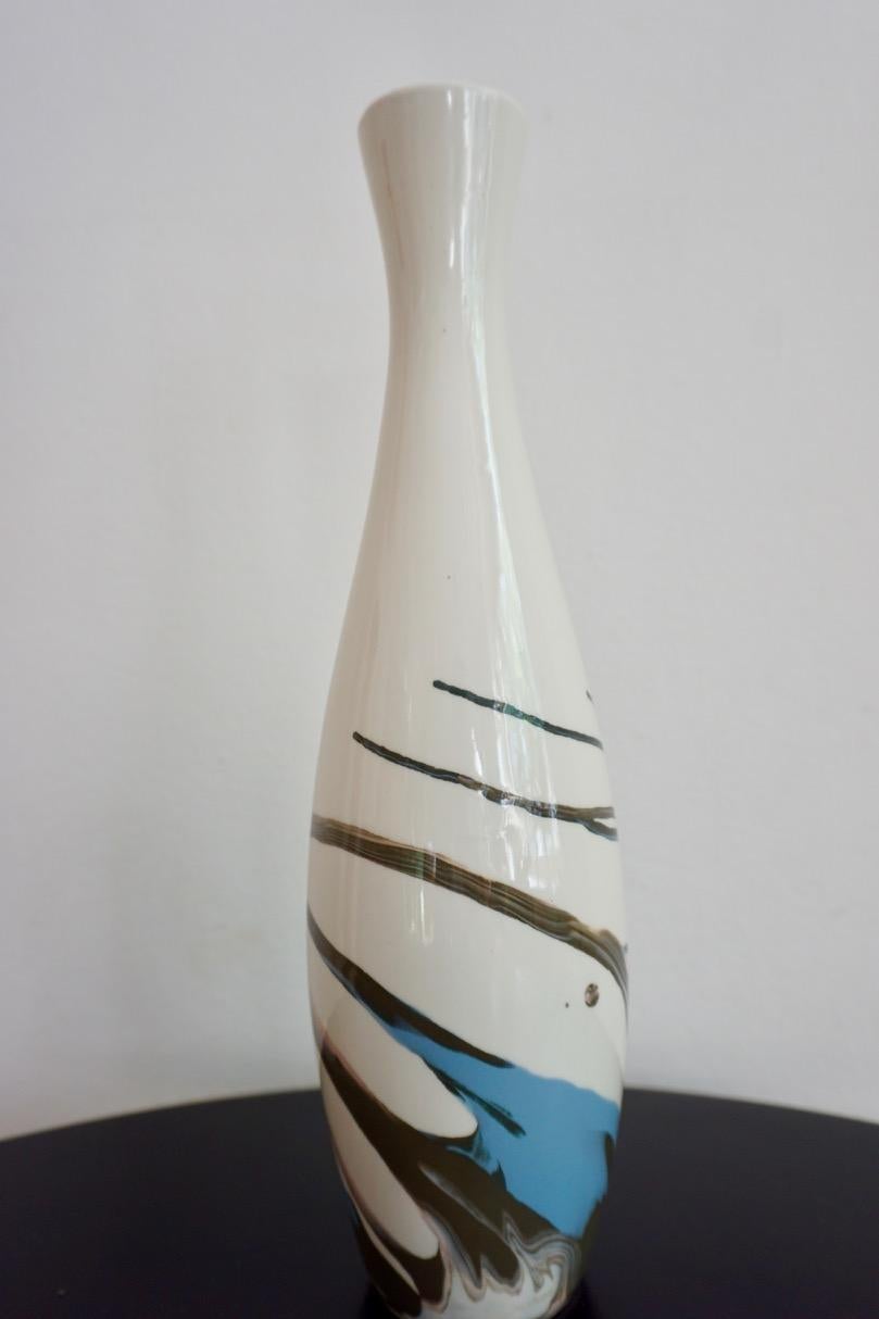 Midcentury Hungarian porcelain vase from Aquincum, 1960s.
This elegant white vase with linear 