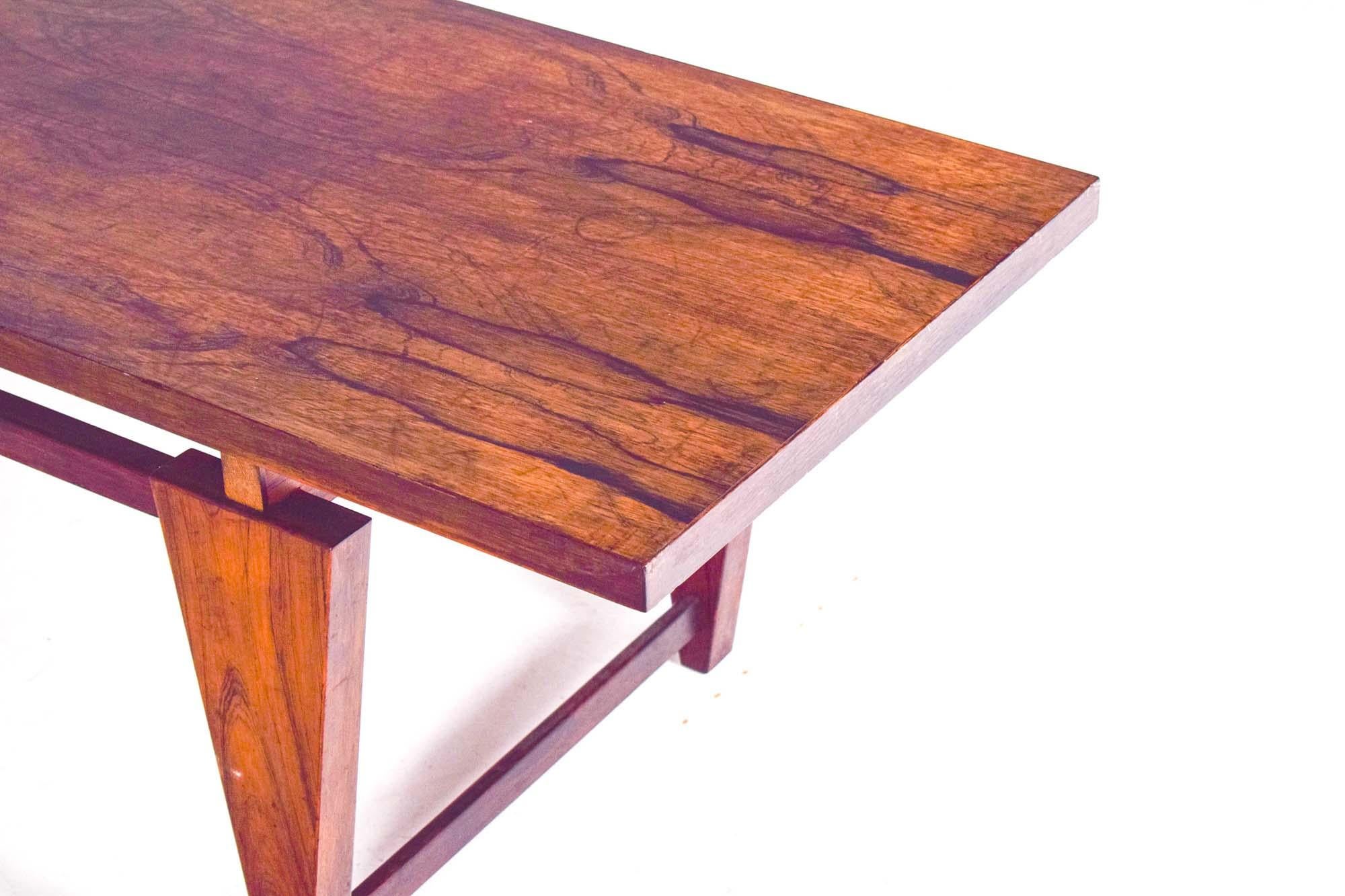 Danish rosewood coffee table by Illum Wikkelso, model ML115, designed in 1960 for Møbelfabrikken Toften. Beautiful rosewood veneer top, Features geometrical design with impression of the table top floating in the air. Very elegant and table with a