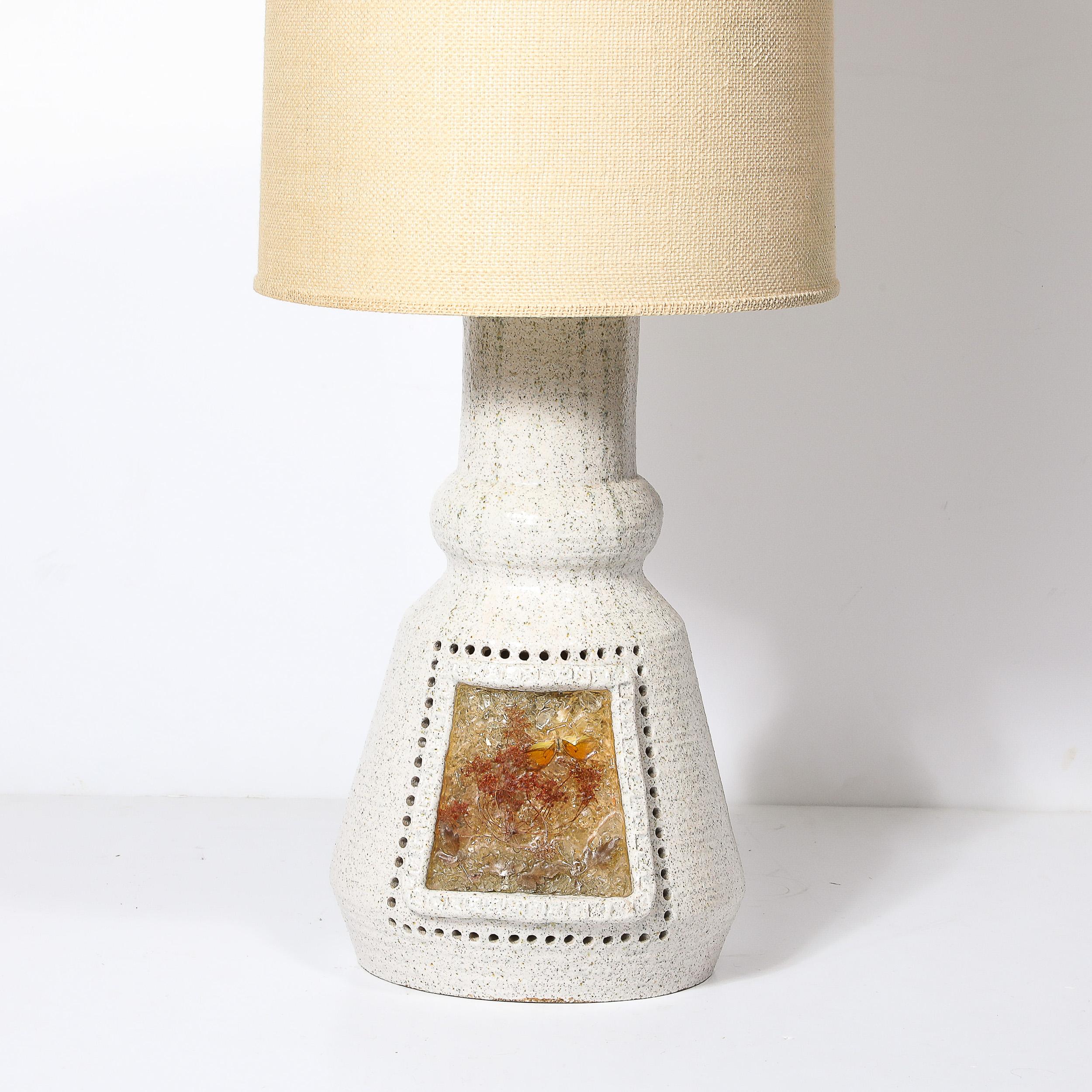 French Mid-Century Illuminated Amber Resin Naturalistic Motif White Ceramic Table Lamp For Sale