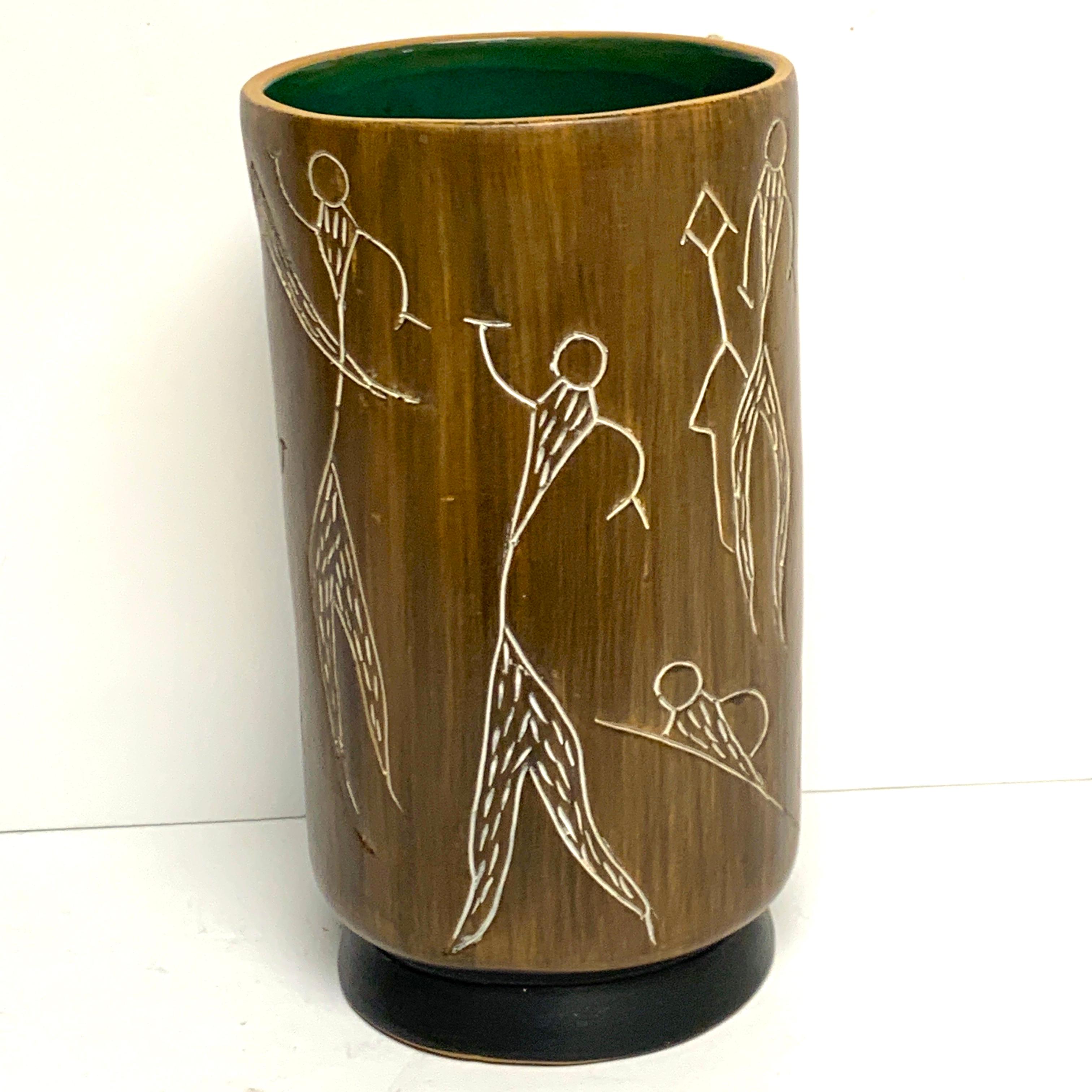Midcentury incised tree bark vase, with continuous abstract figures raised on a 
5