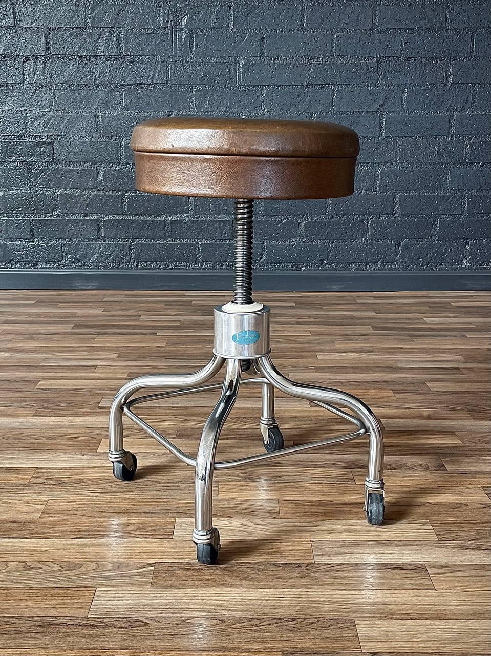 Condition: Original Vintage Condition

Designer: Pedigo
Manufacturer: Pedigo
Materials: Chrome Metal, Original Brown Vinyl Upholstery 
Dimensions: 17” -26