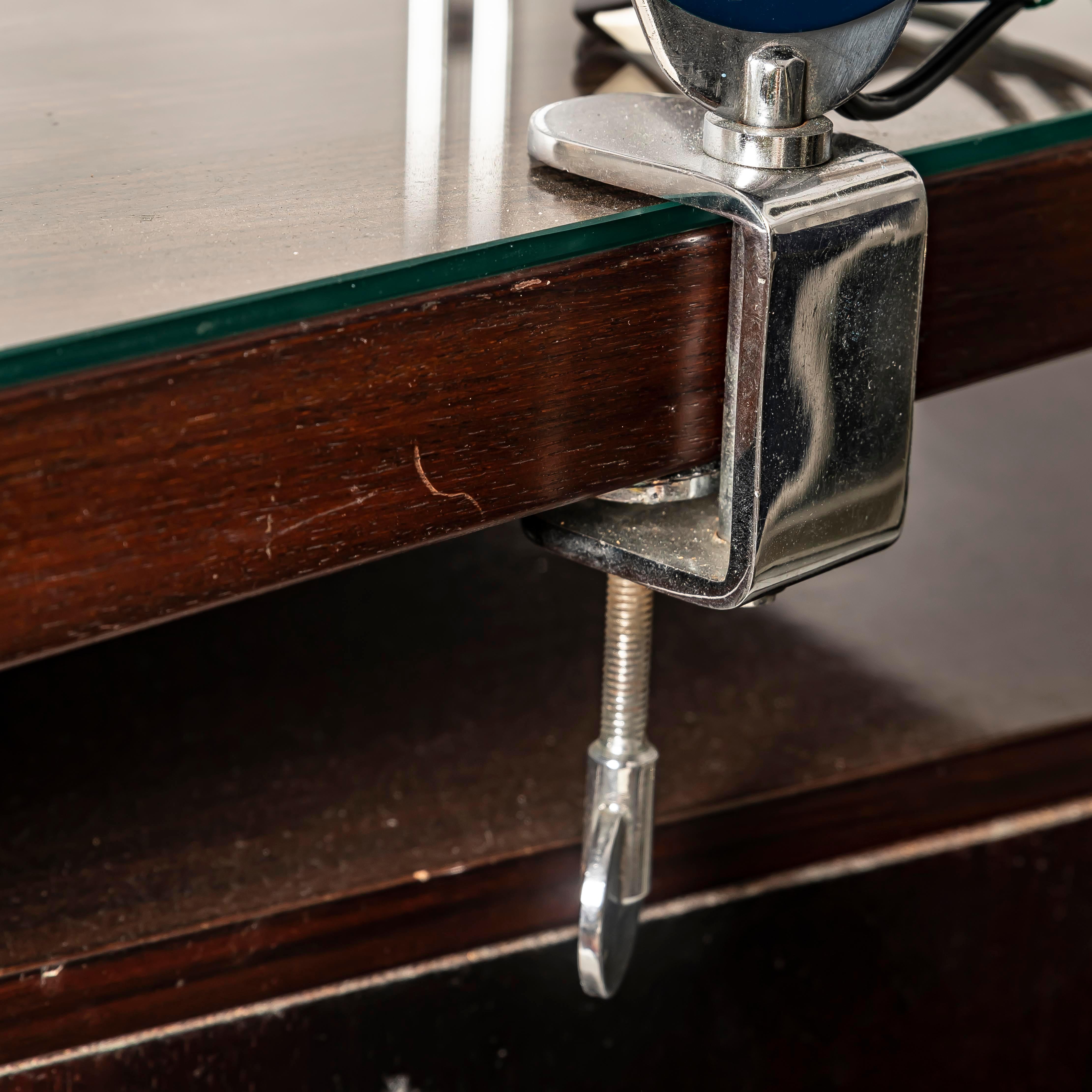 The Mid Century Industrial Spanish Clamp Desk Lamp by Ramón Bigas i Balcells, dating back to the 1960s, is more than just a functional lighting piece—it's a slice of design history. Bigas, a celebrated Spanish designer known for blending utility