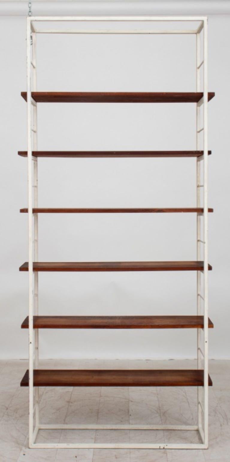 Mid-Century Industrialist etagere with white painted metal frame and six wooden shelves. Provenance: From a 1025 5th Avenue estate.

Dealer: S138XX