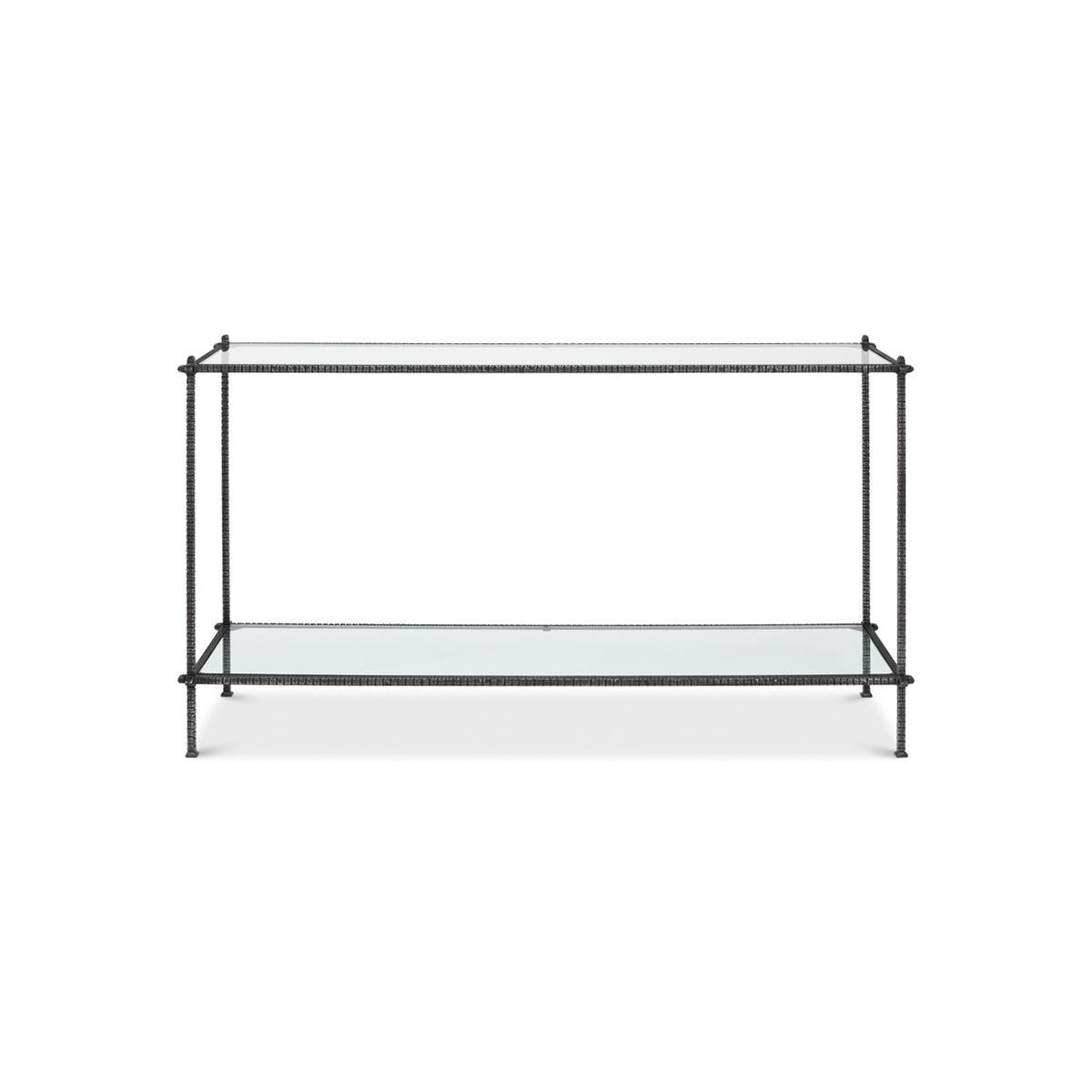 Mid-century iron and glass console table, the frame is solid iron bar stock that is hand wrought and incised with continuous ridges on all 4 sides. With three-point corners, an inset glass top tier and a lower shelf stretcher base.

Dimensions: