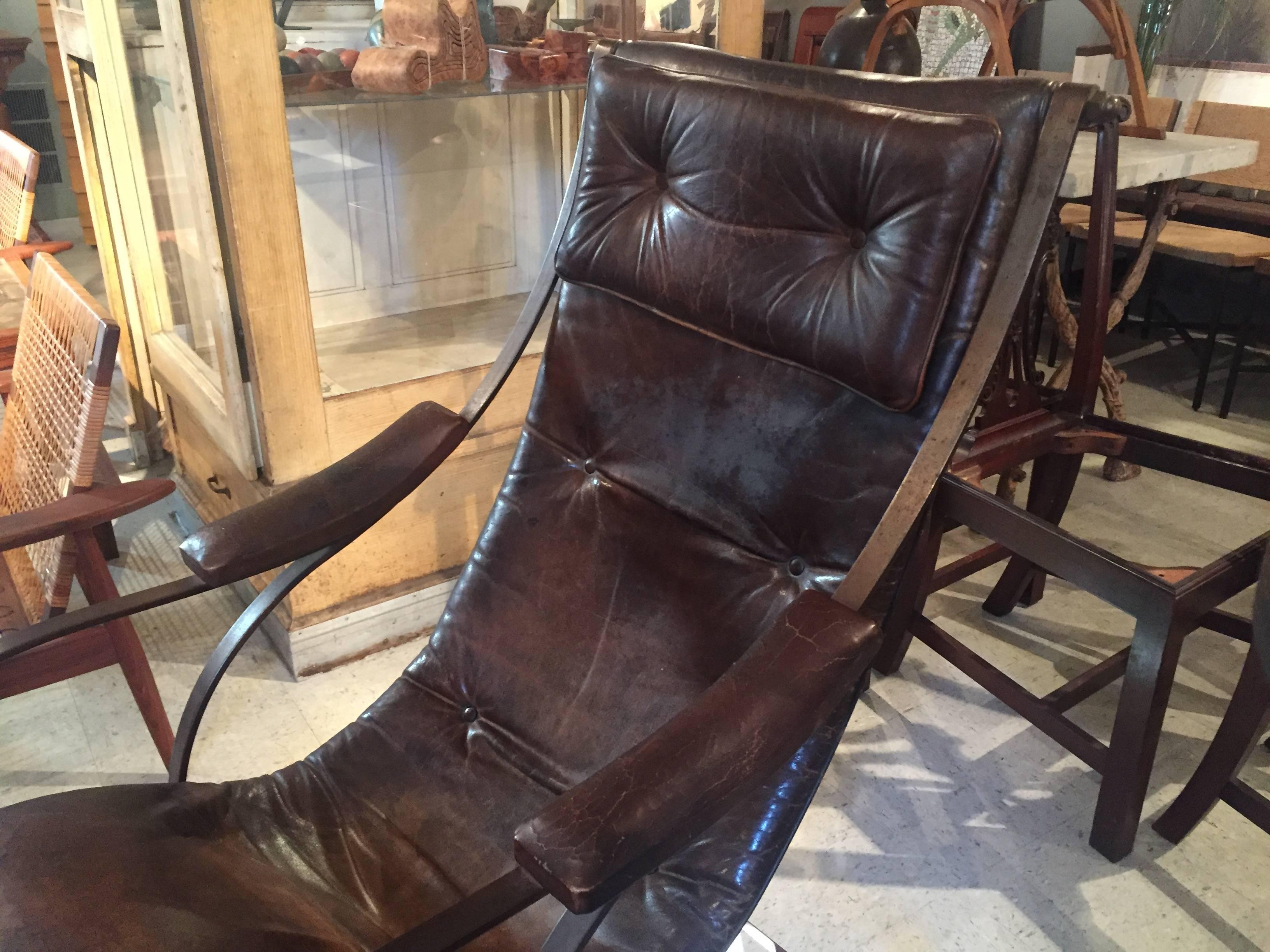 Amazing MCM leather and steel rocker. Looks as much like a sculpture as a piece of very comfortable furniture. Great all-over patina.