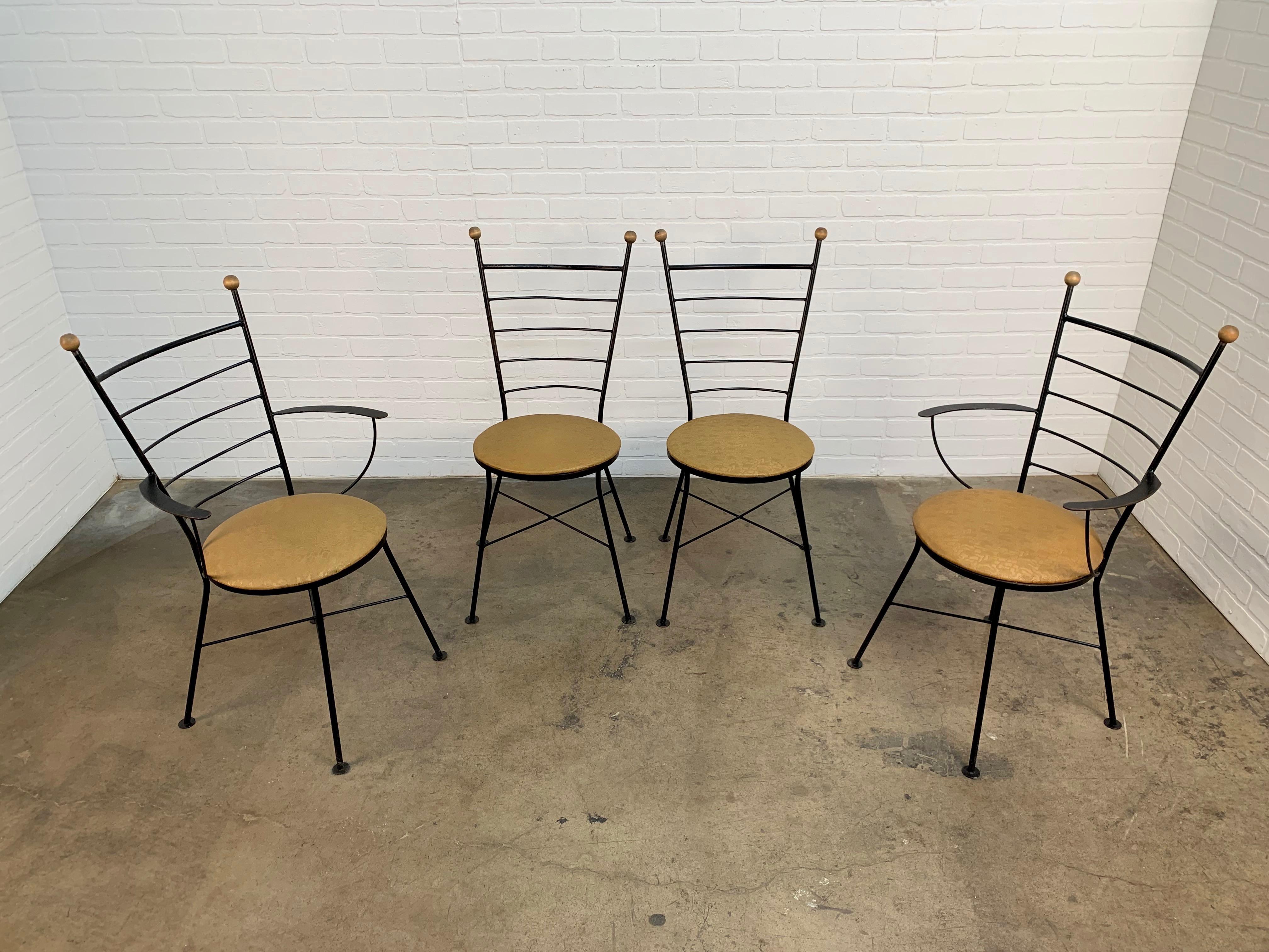 Set of four iron X-base stretcher with wood finials and saucer feet patio chairs
There are two armchairs and two side chairs. The vinyl seats are in very good condition. In the style of Paul McCobb.