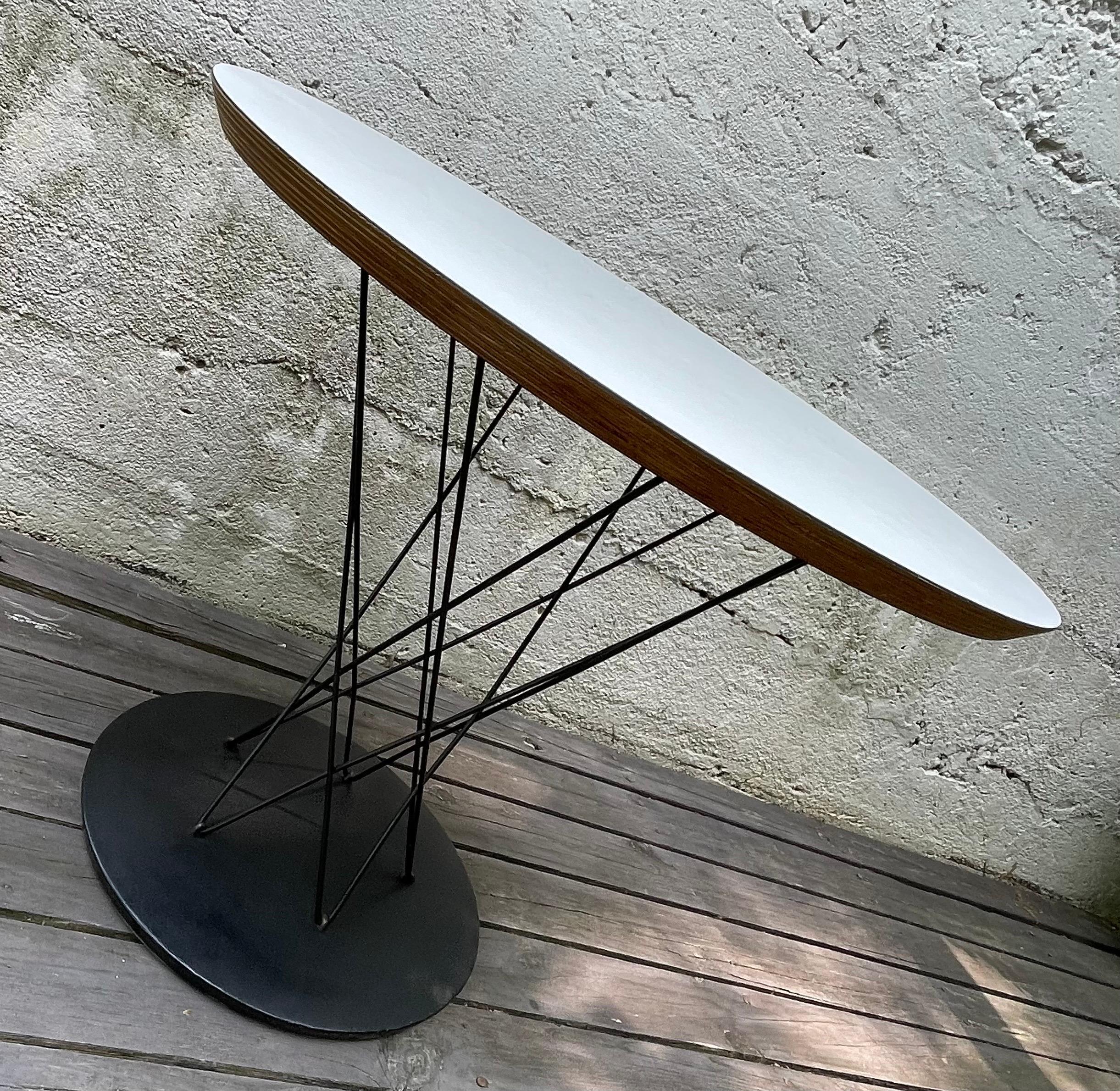Midcentury Isamu Noguchi Cyclone side table, Model 87 circa 1970 for Knoll International. Original condition, professionally cleaned.

Isamu Noguchi was an acclaimed American sculptor, furniture designer, and landscape architect. Throughout his