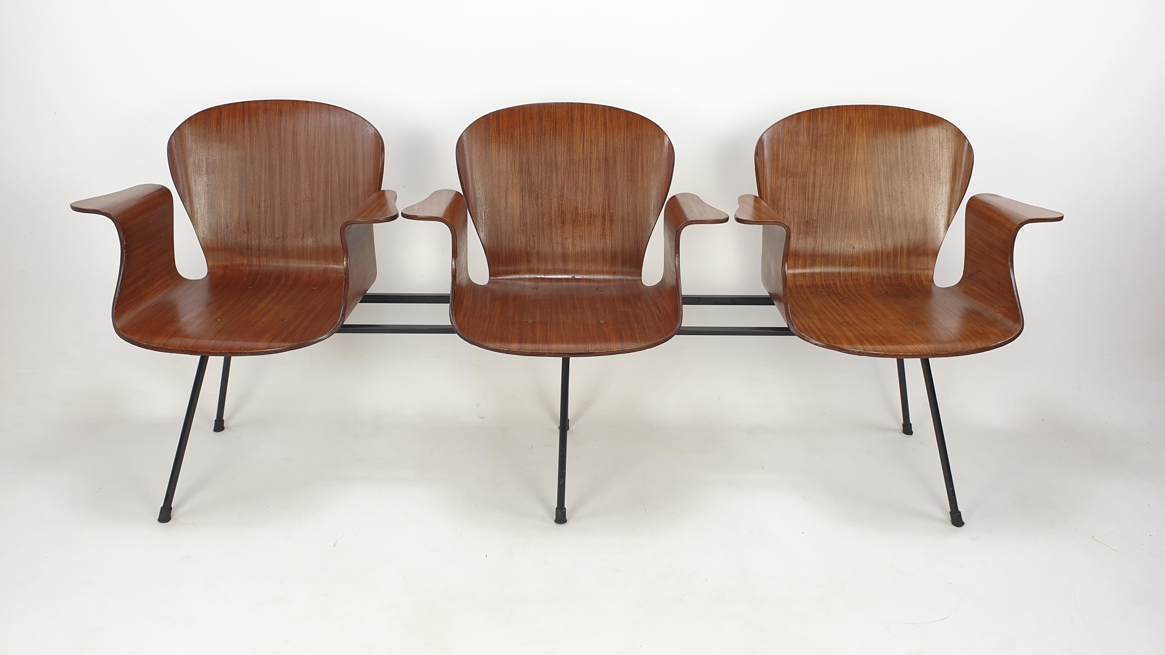 Very rare and beautiful Italian 3-seat bench by Carlo Ratti, 1950's. 

It is made of 3 molded teak seats supported by black steel legs, accented with brass hardware. 

Designed with lovely curves, a really piece of art!

It has the normal