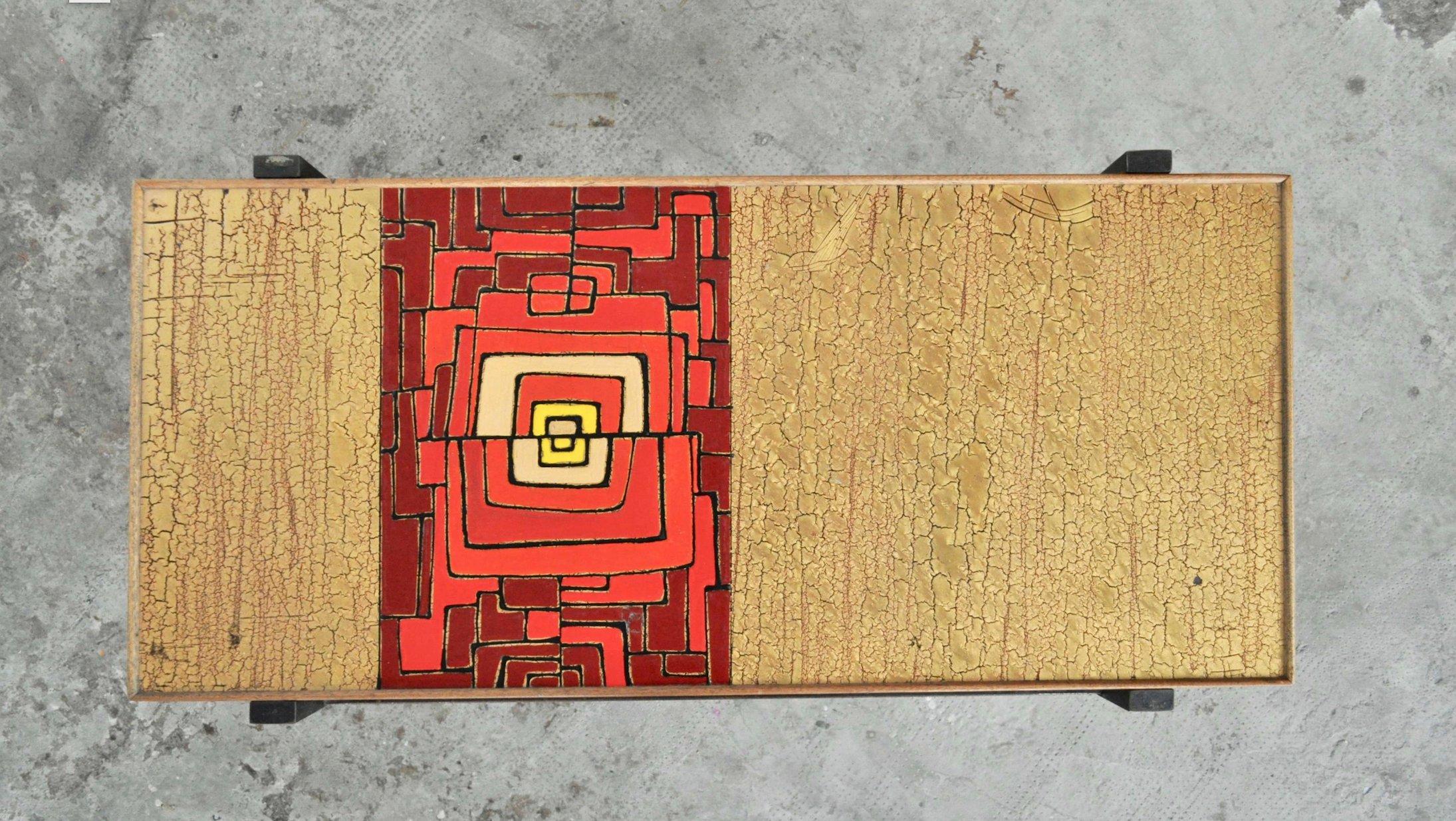 Mid-Century Italian Afrormosia Coffee Table – 1950s Iron and Colored Resin

Elevate your living space with this striking Mid-Century Italian coffee table from the 1950s, featuring a unique blend of Afrormosia wood, iron, and vibrant colored resin.